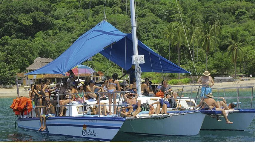 Catamaran full of guests enjoying My Deztination Puerto Vallarta cruise.