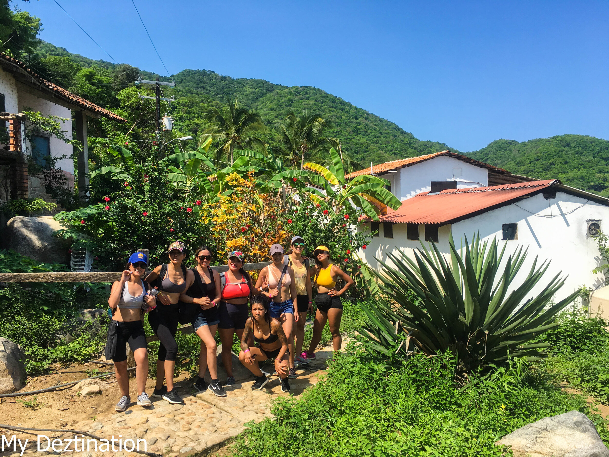Group pausing in a small village along the Las Ánimas boutique hike.
