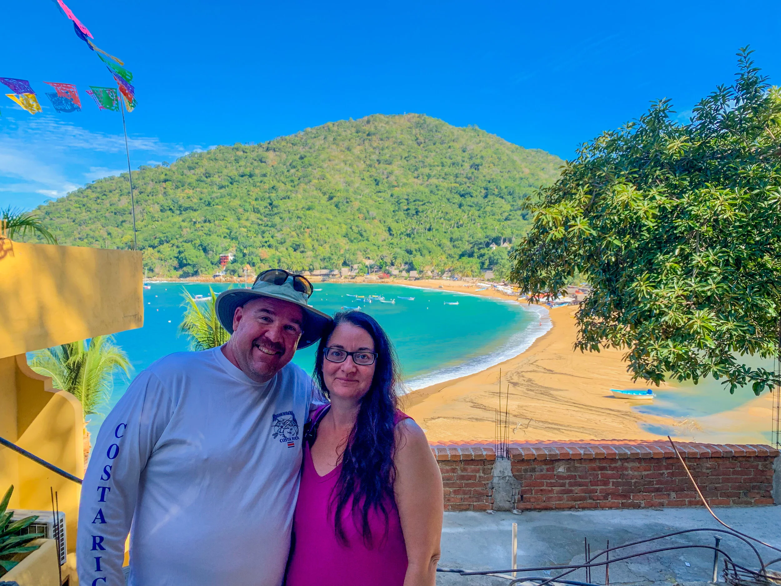 Couple at scenic viewpoint above Yelapa Beach on a private tour.