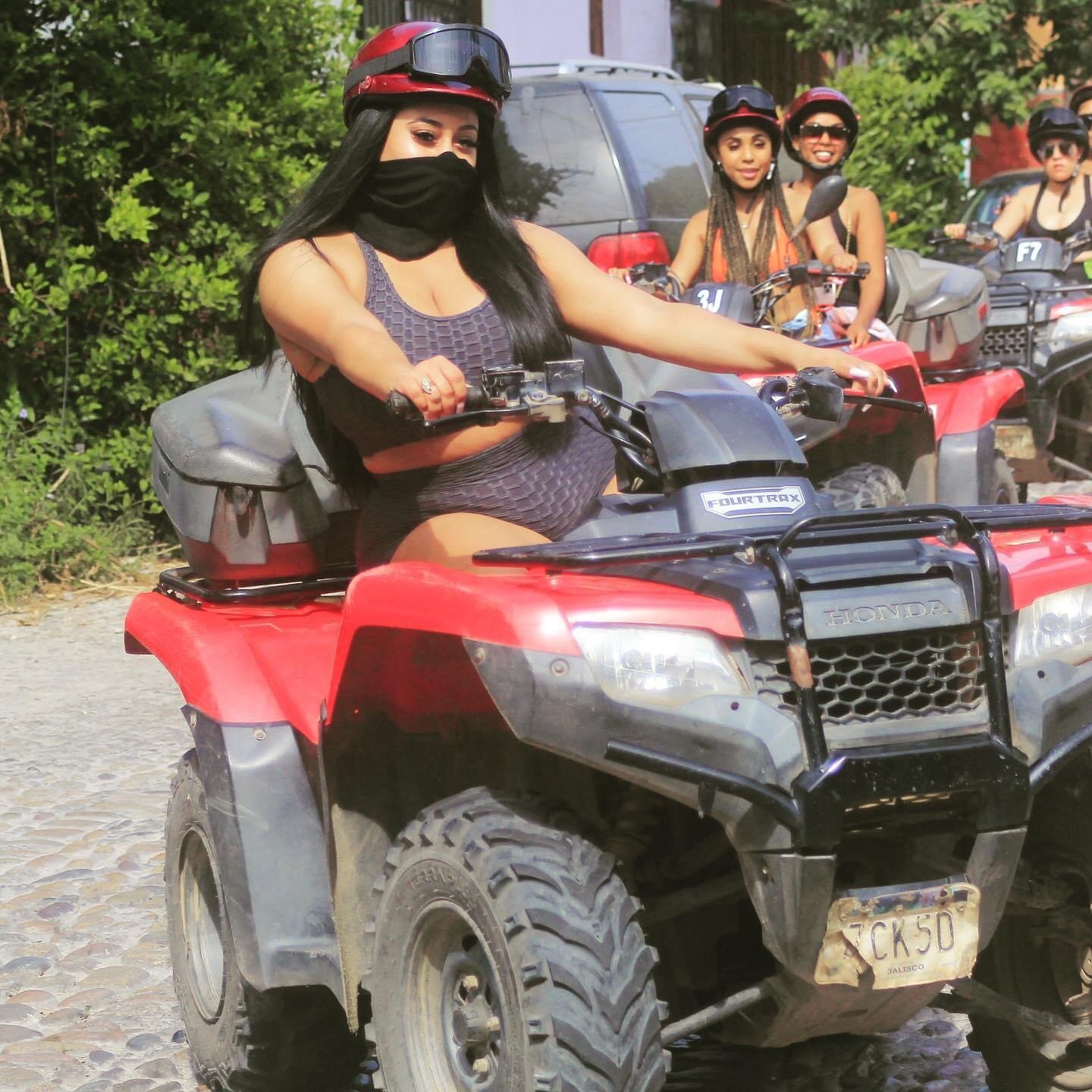 Guest in bikini enjoying ATV ride on My Deztination Puerto Vallarta tour.