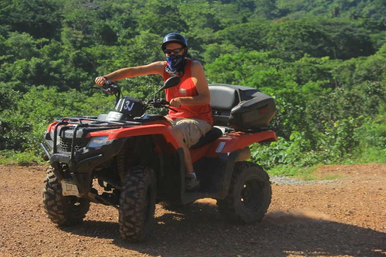 Guest turning ATV sharply on My Deztination adventure ride.