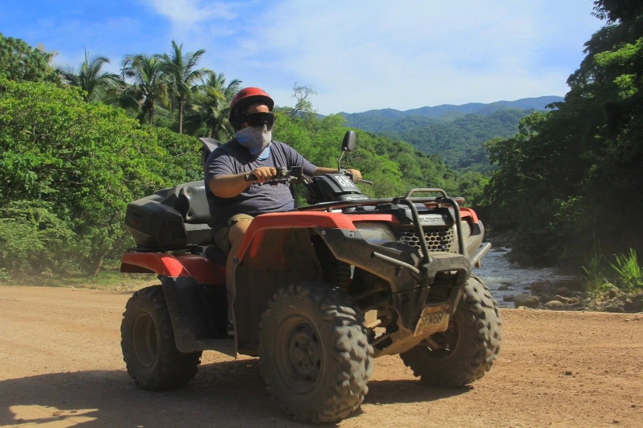 Guest riding ATV on My Deztination Jungle & City Adventure.