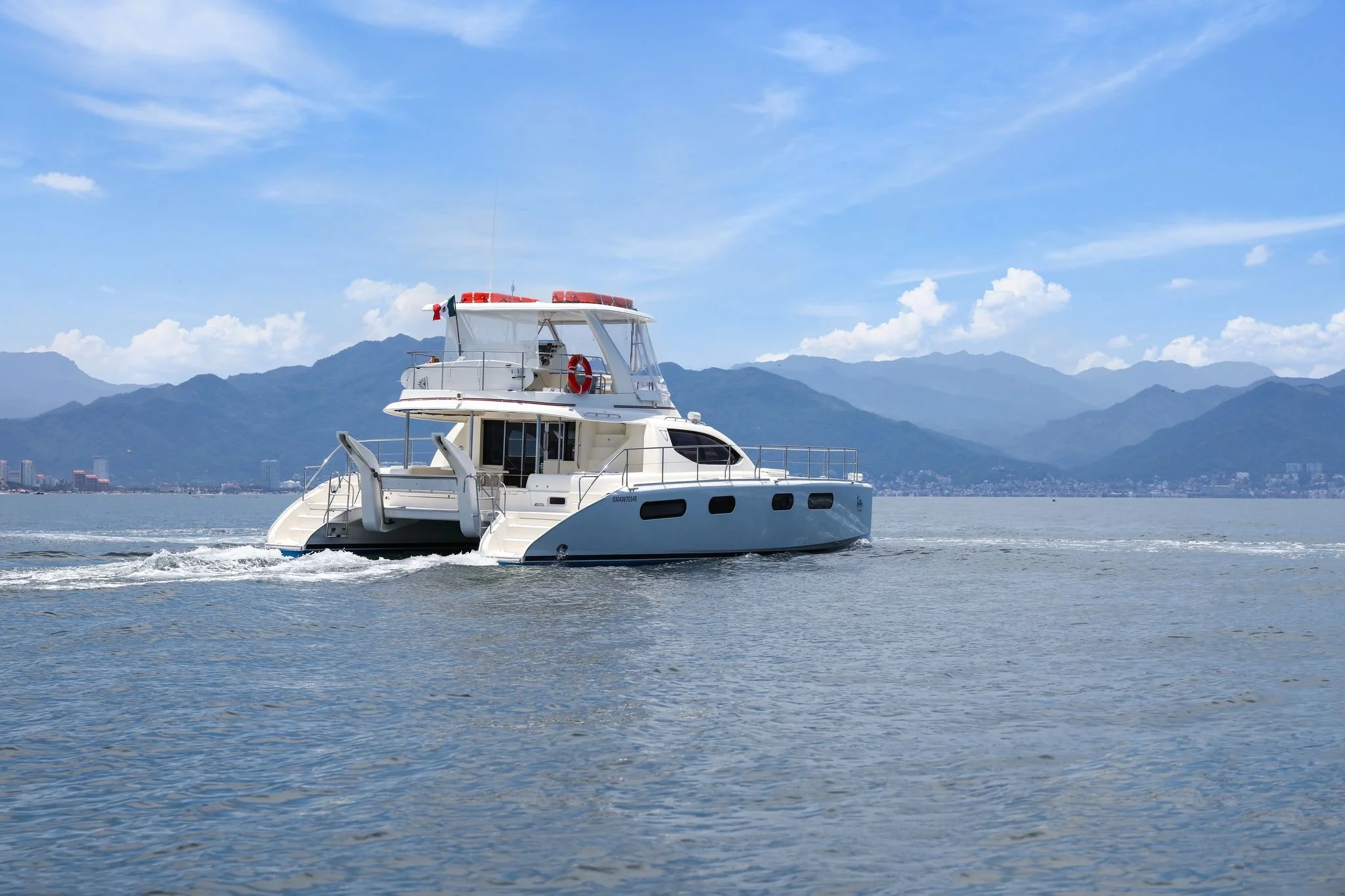 Luxury yacht sailing across Banderas Bay on My Deztination private charter.