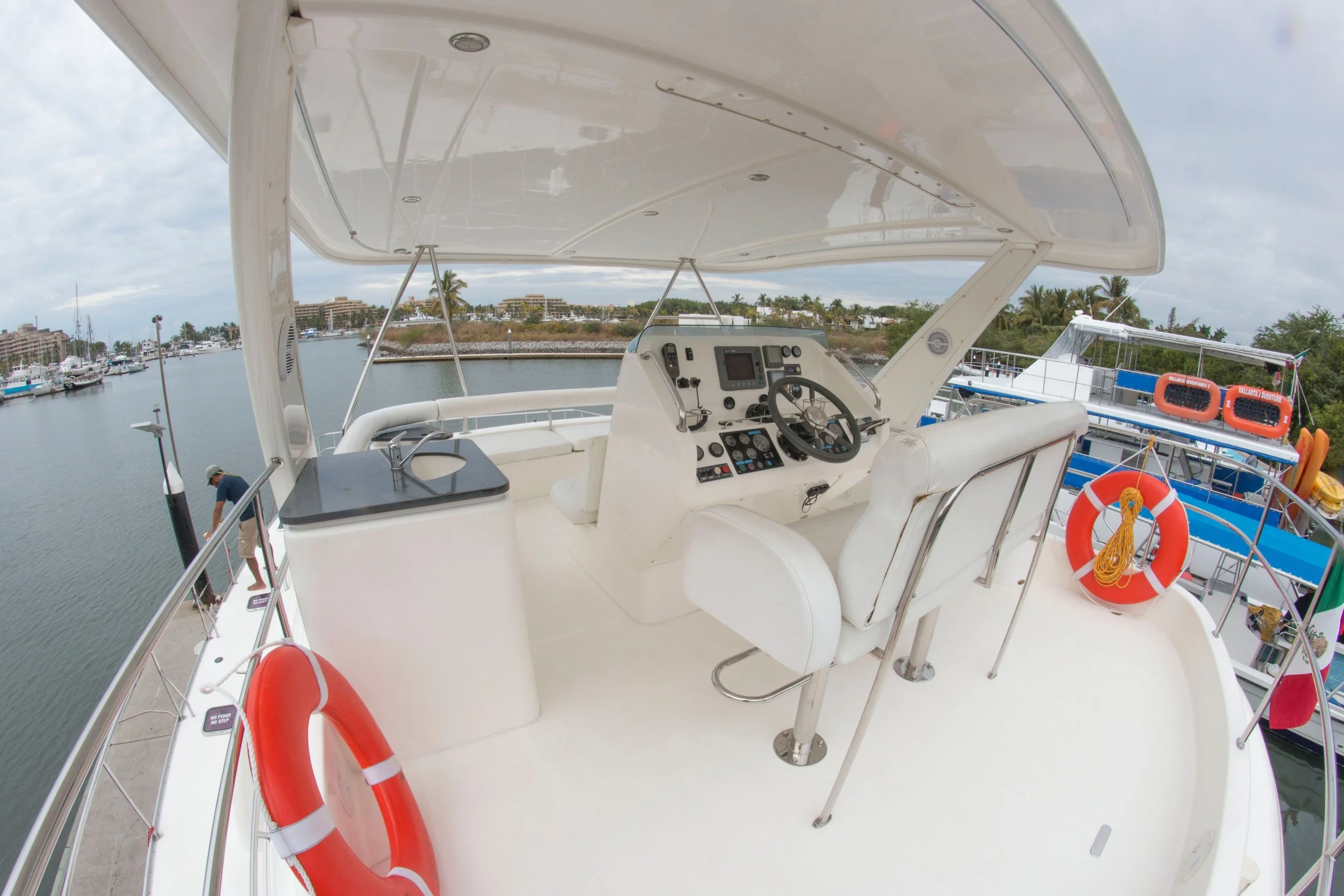 Captain’s seat inside luxury yacht on My Deztination private charter.