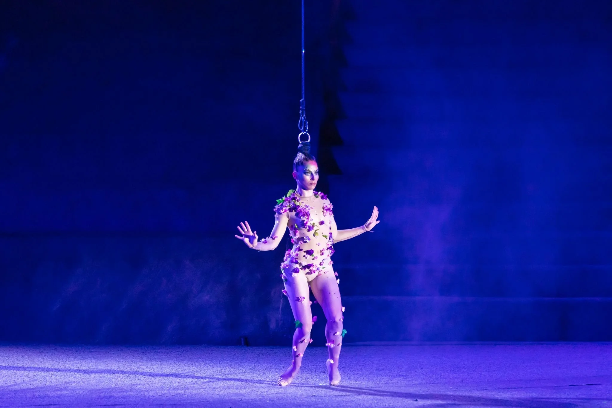 Stage performer in action during Rhythms of the Night show with My Deztination.