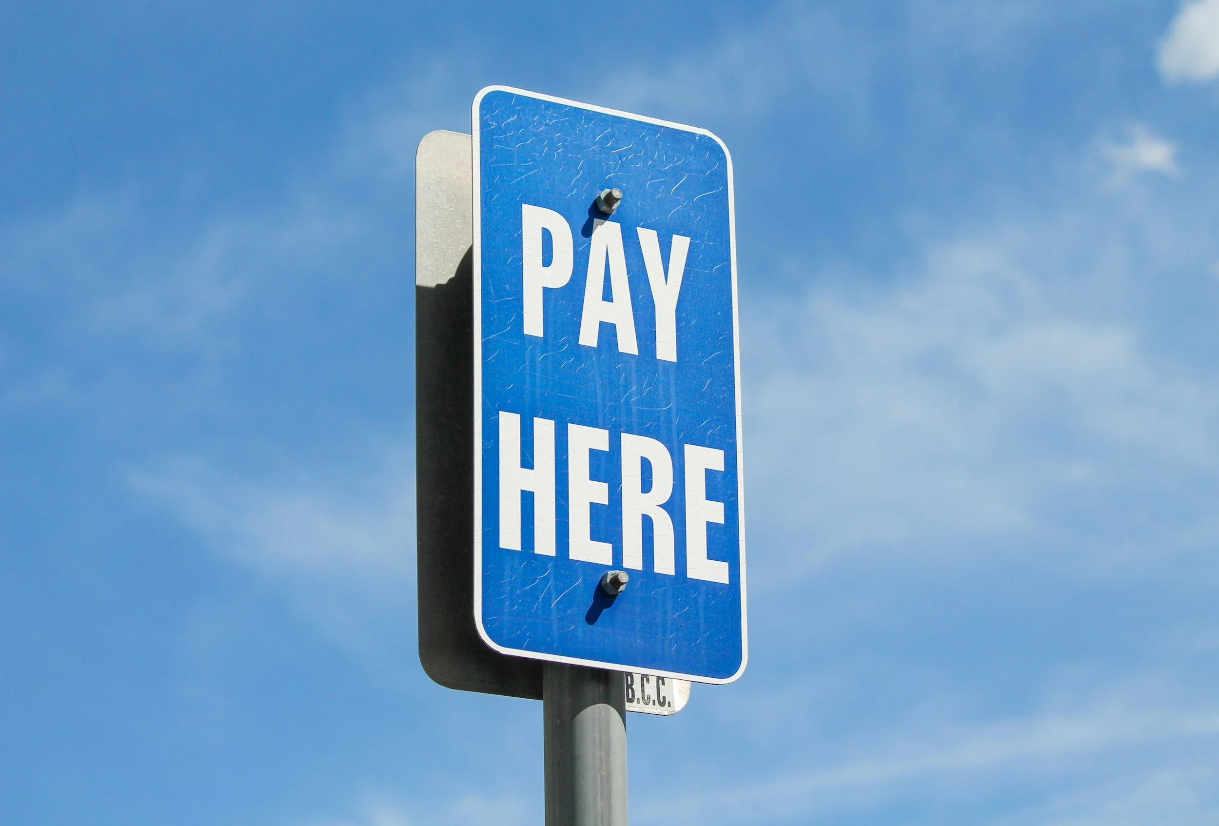 Pay Here sign - receive full relocation and TIP support from My Deztination