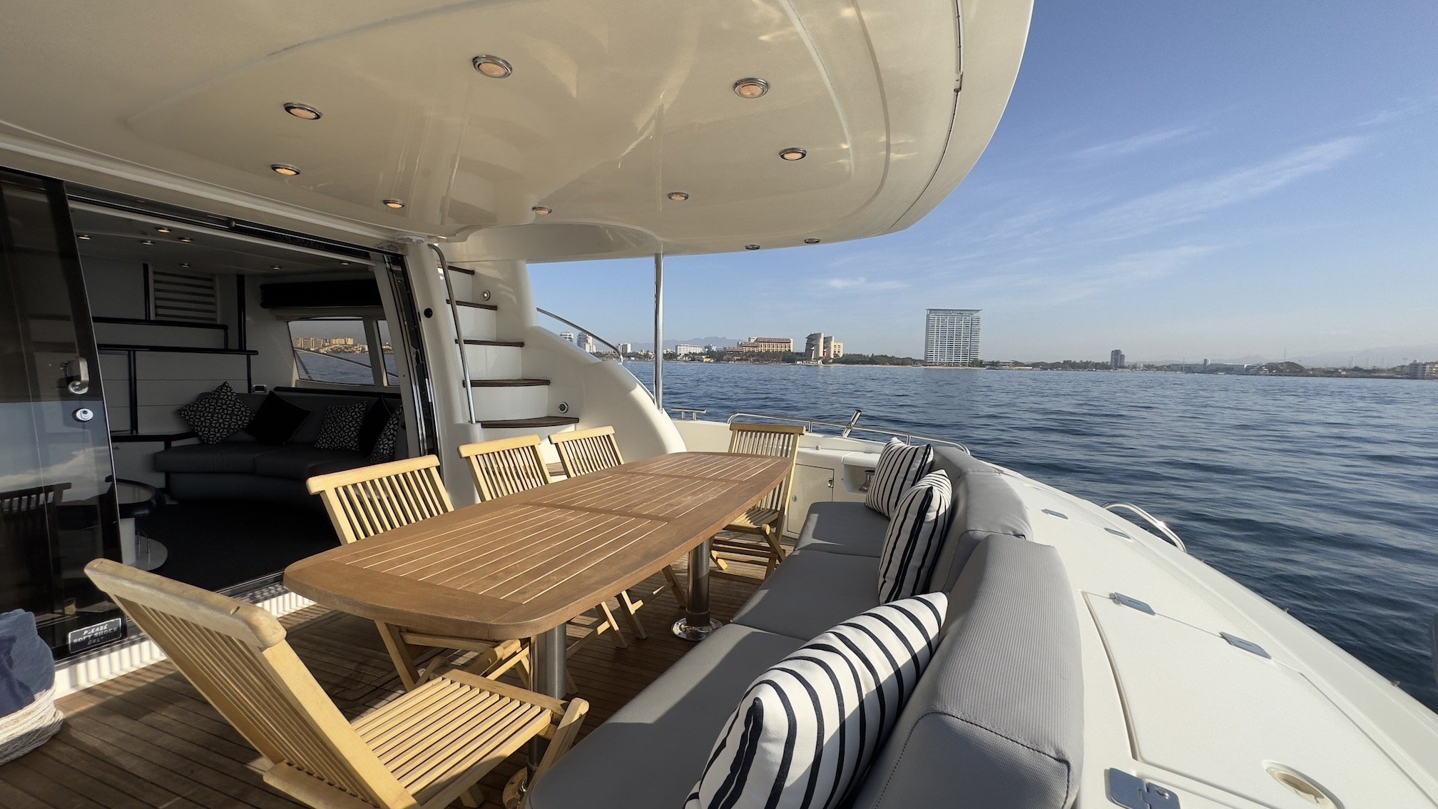 Outdoor seating area on luxury yacht during My Deztination charter.