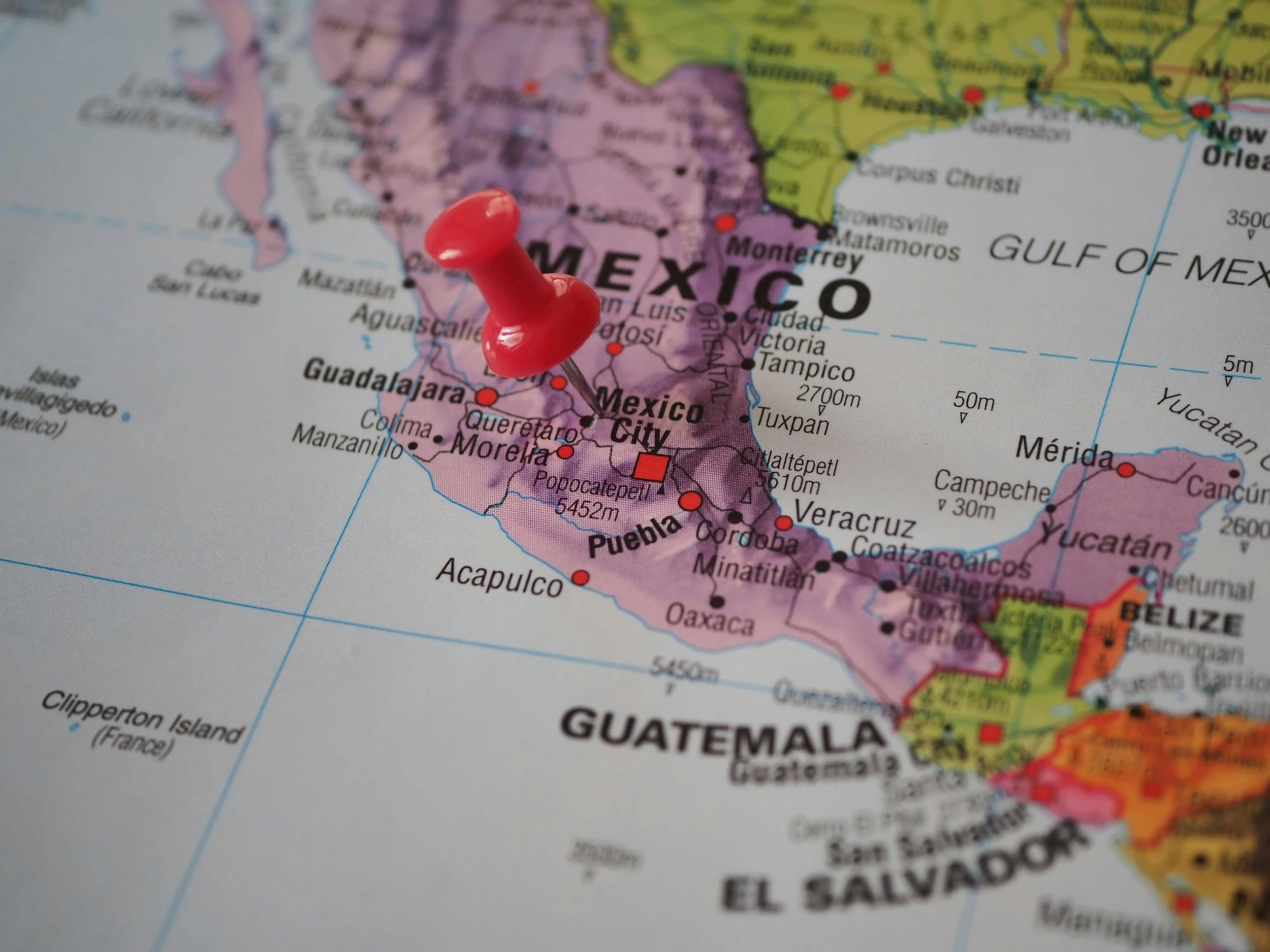 a pin on a map of mexico - mexico is a large diverse country with a lot to offer