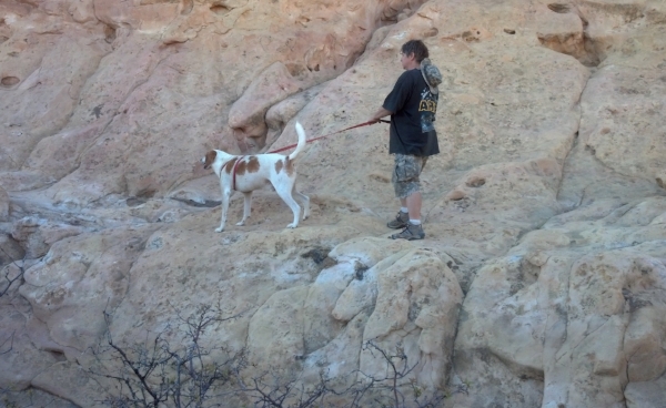 The author with my hound dog, Jake, as Sandstone Bluff, El Malpais State Park, NM