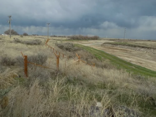 A restored section of the barbed wire fence at Minidoka internment camp
