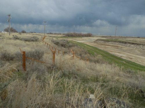 A restored section of the barbed wire fence at Minidoka internment camp