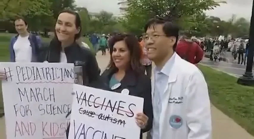 Dr. Senator Pan poses with two pediatricians who were marching for science in Washington D.C. - Still from PANdemic of Lies at the March for Science