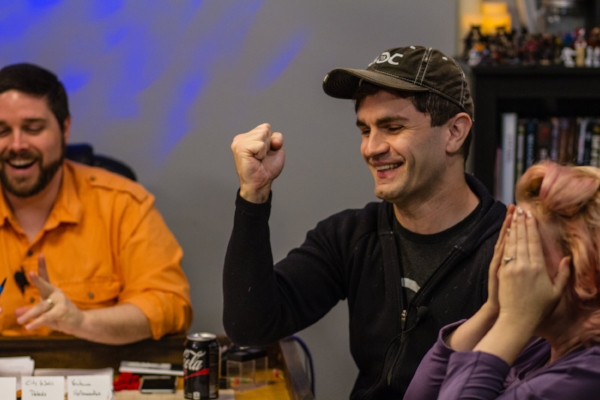 Sam knows his die roll was good enough to succeed, but Elisa sees the twist of negative consequences on the horizon. Left to right: Rodney Thompson, Sam Witwer, Elisa Teague. Photo by John French.