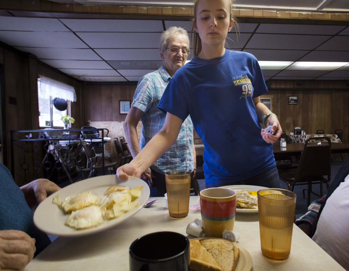 Bonnie Shifflet of Bonnie’s Restaurant, left, has full custody of her three grandchildren. Bonnie’s granddaughter Keirsten is currently a senior at Trimble High School and works as a waitress at the restaurant. She says she was “basically raised” there, and started helping out whenever she was 12 years old.