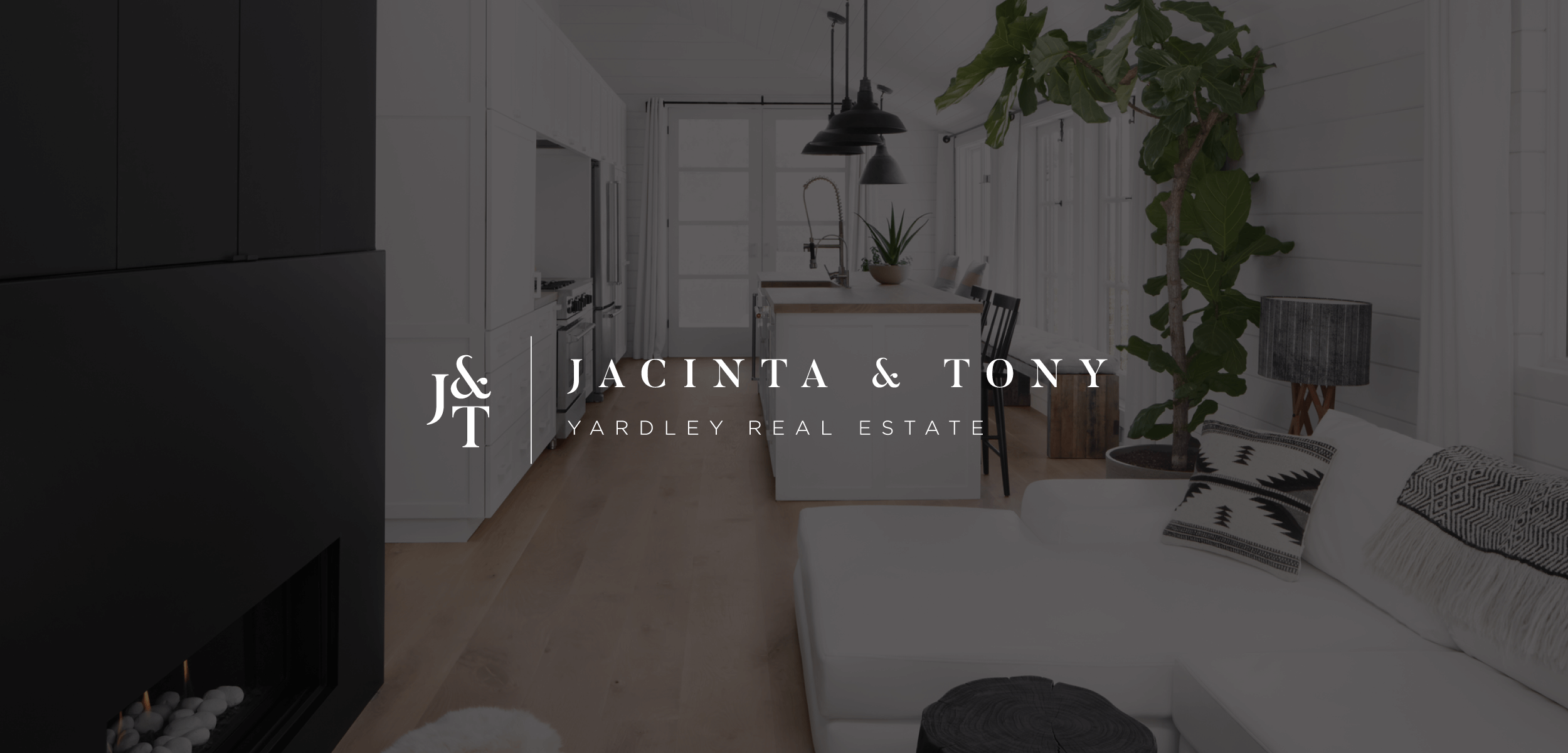 Jacinta and Tony Yardley Real Estate logo. 