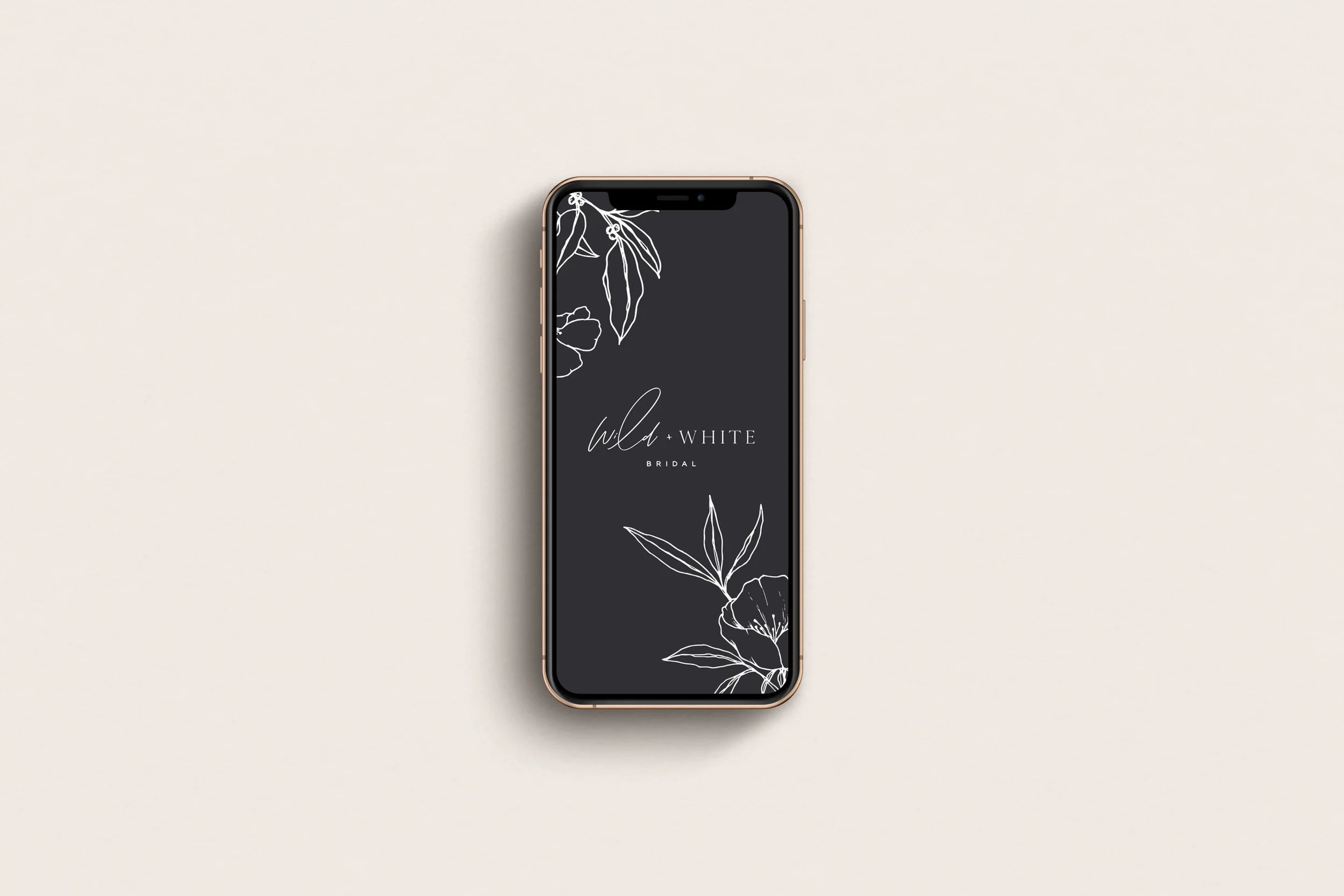 Wild and White Bridal logo on mobile - by January Made Design