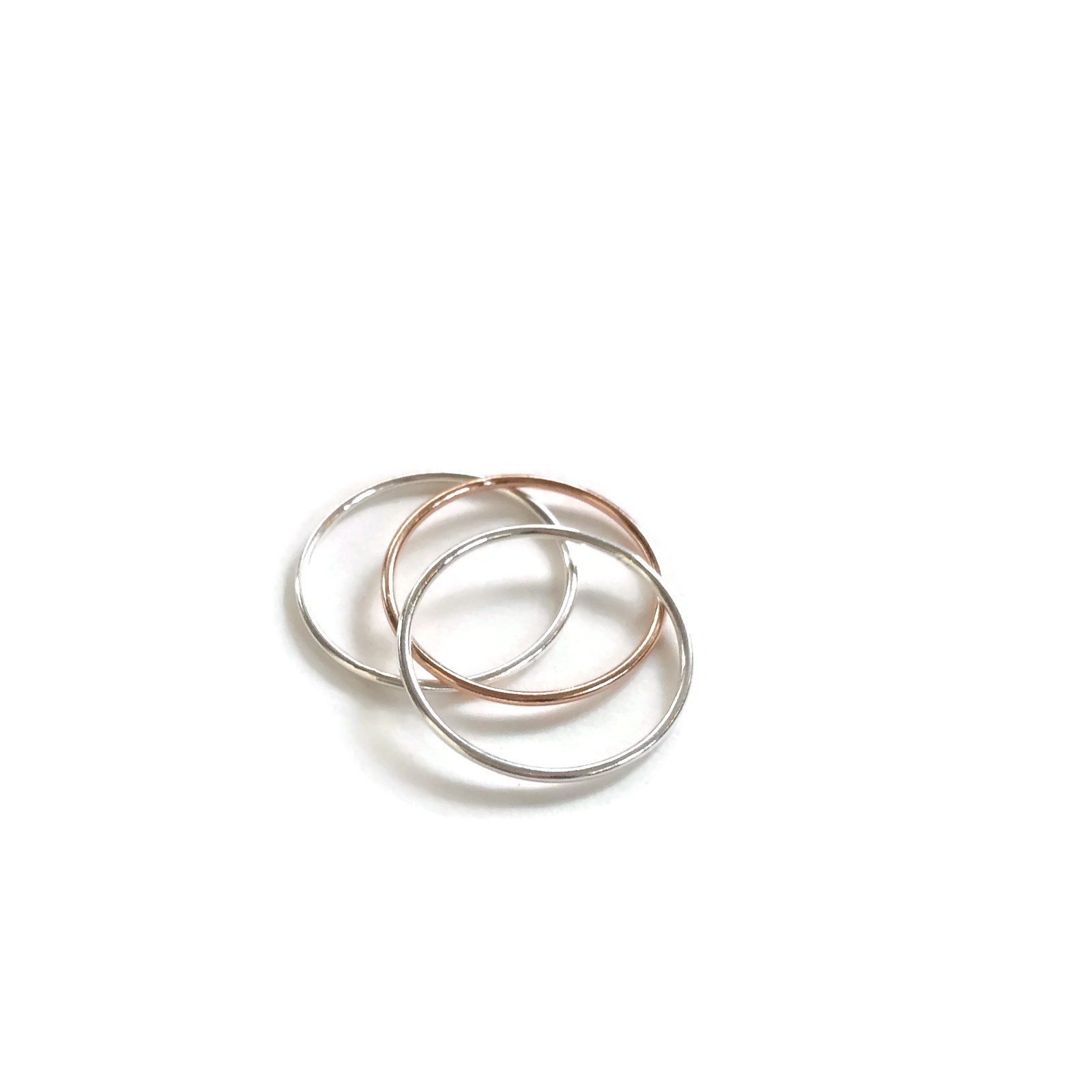 Three Thin Silver Stacking Rings Flat.jpg