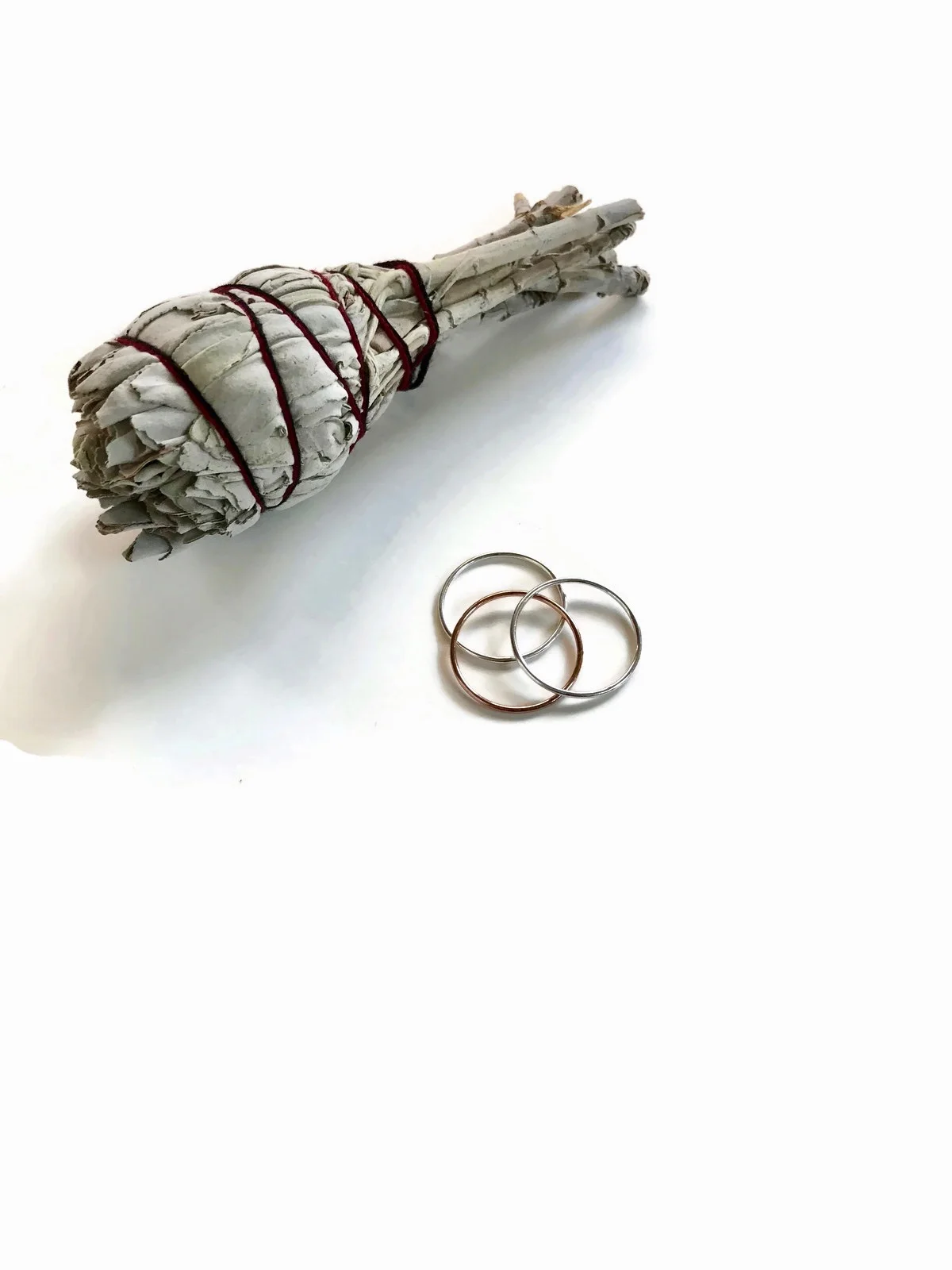 Three Thin Silver Stacking Rings Styled.jpg