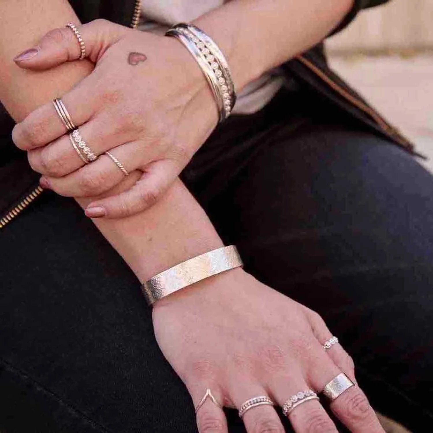 open_petal_ring_model_sitting.jpg