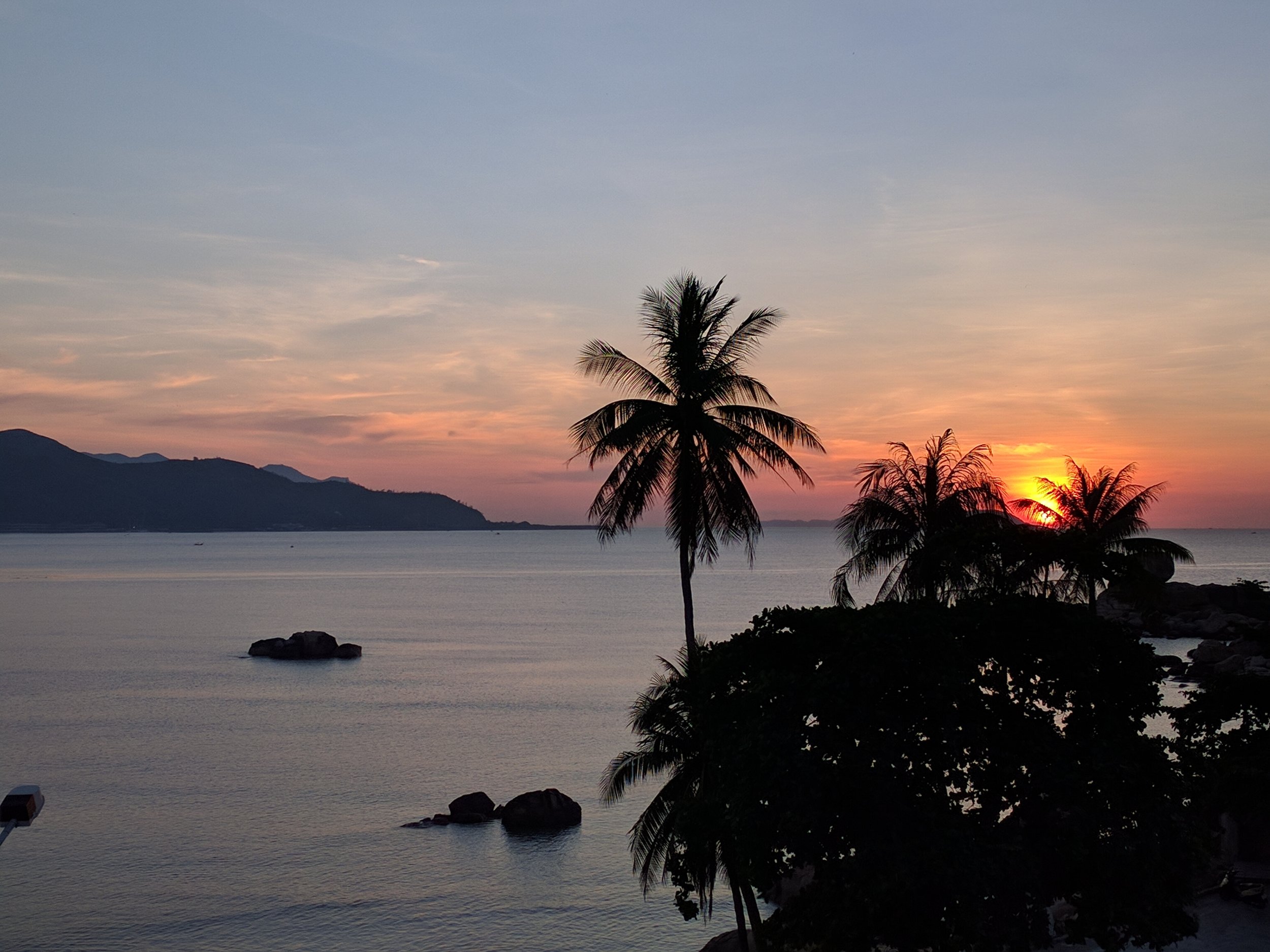 View at sunrise from the balcony of our first hotel in Nha Trang