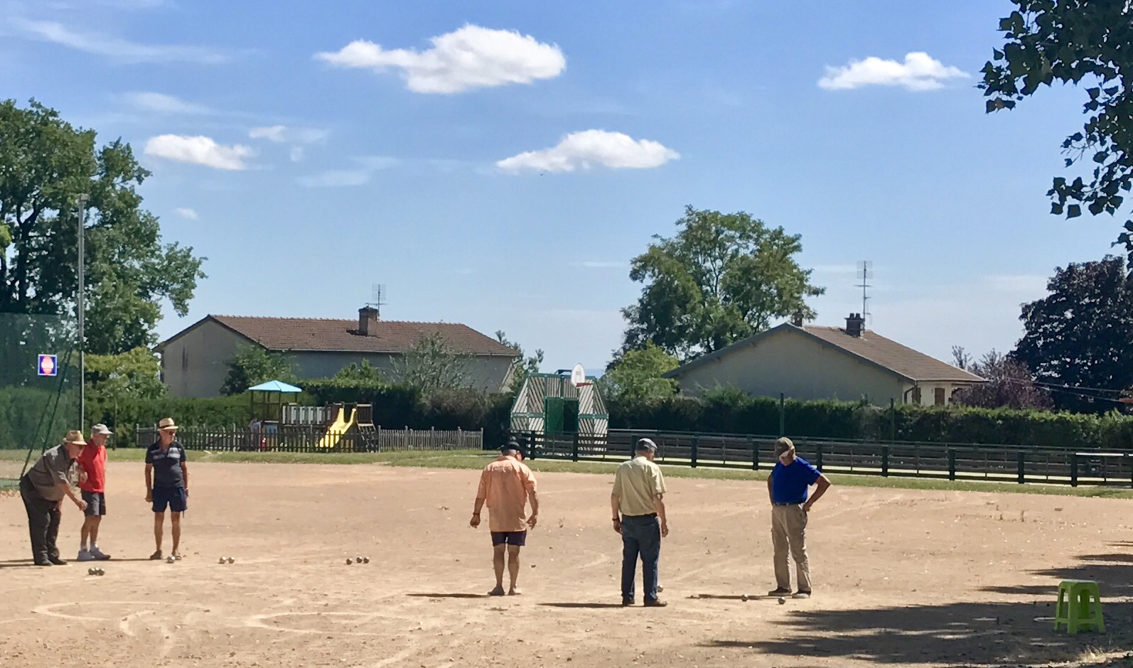 Scenes from our drive through the villages...A midday boules game in action