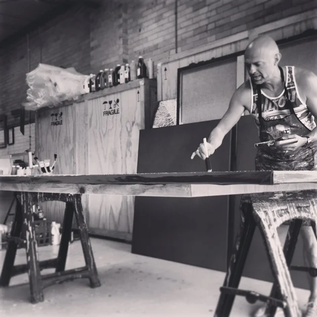 Master painter, Thierry B at work in his Huntingdale studio.