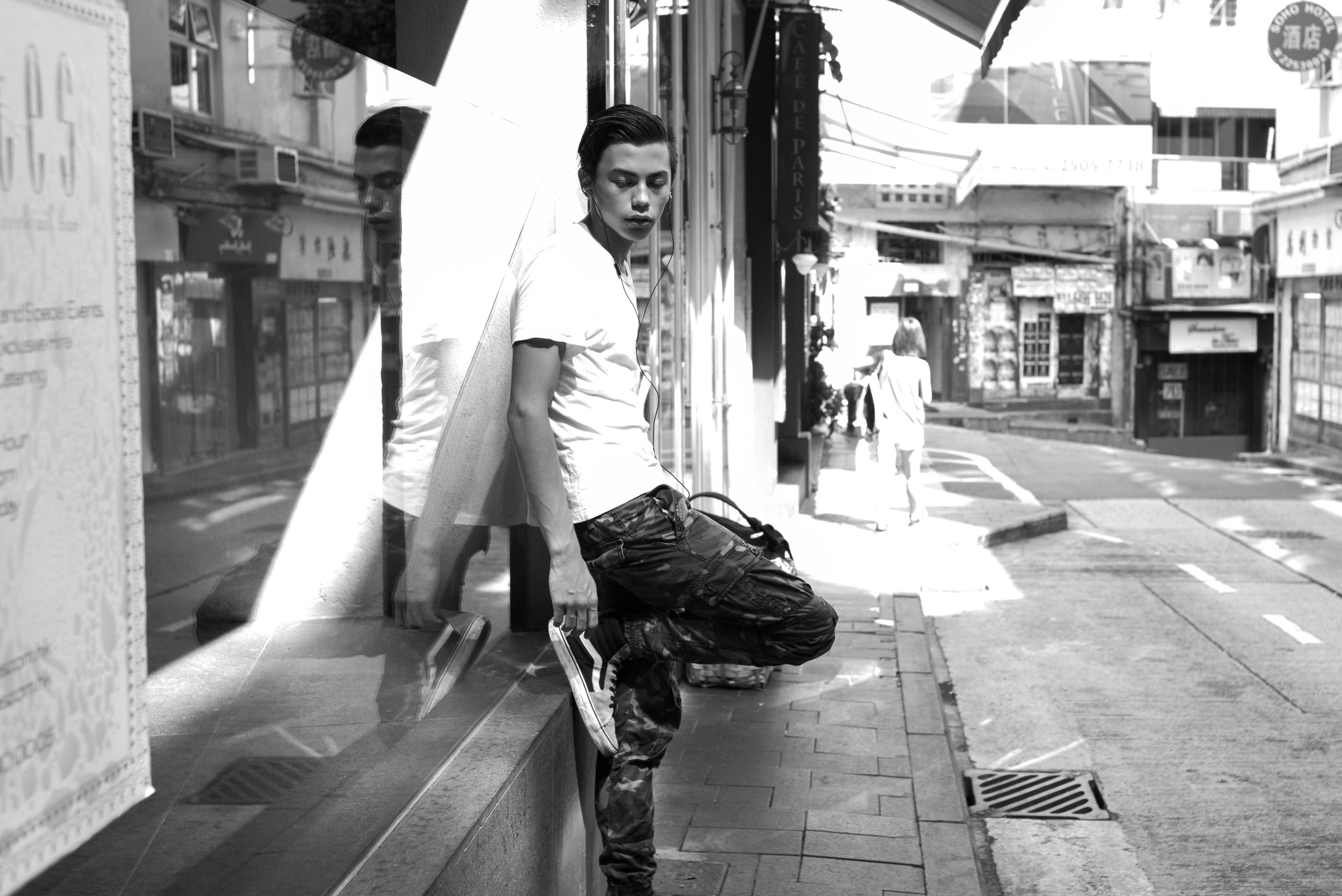 This image was shot on a Leica M 246 Monochrome. It was accidentally overexposed by one stop. The subjects legs were in shadow, but his upper body was under an extremely bright beam of sunlight. I was able to retrieve a reasonable amount of details from the overexposed shadows in Lightroom, but the highlights were blown beyond repair.