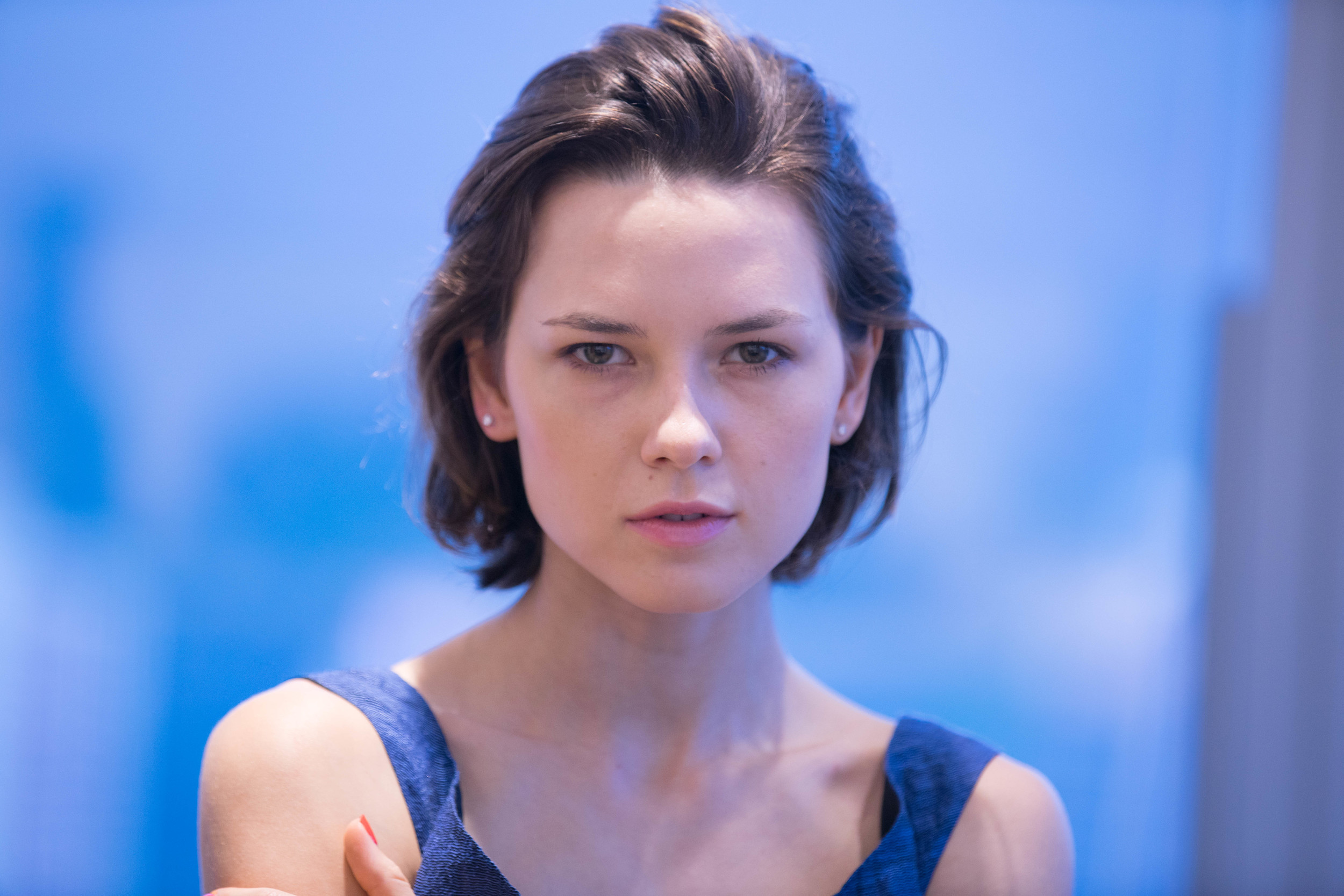 Canon 70-200mm f/2.8 USM II set at 200mm. This is the standard for most portrait rendering.