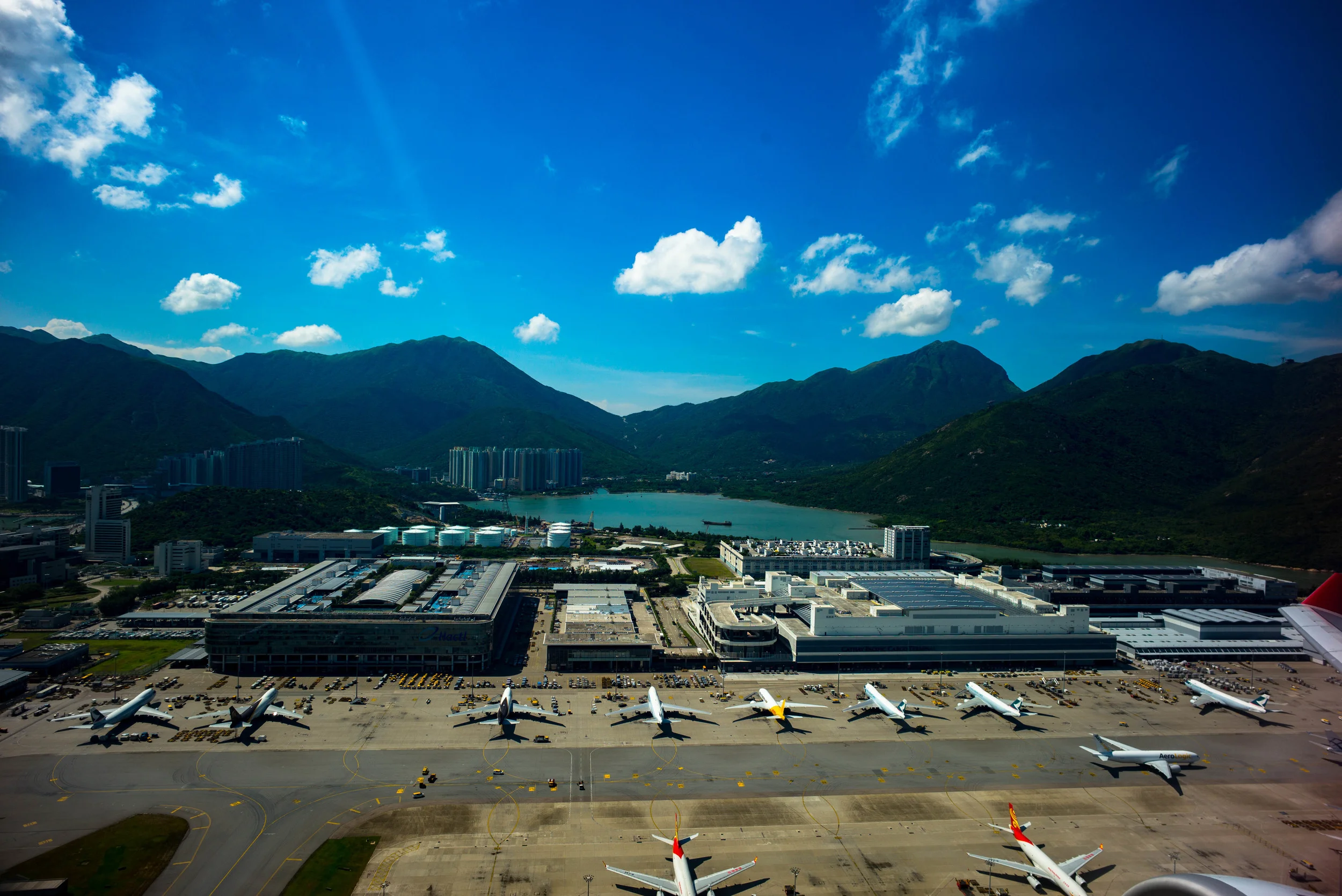 The colors of this image is very vibrant and contrasty. Does that make it art? And don't the planes look so small - like miniatures. This certainly qualifies for an artistic image!