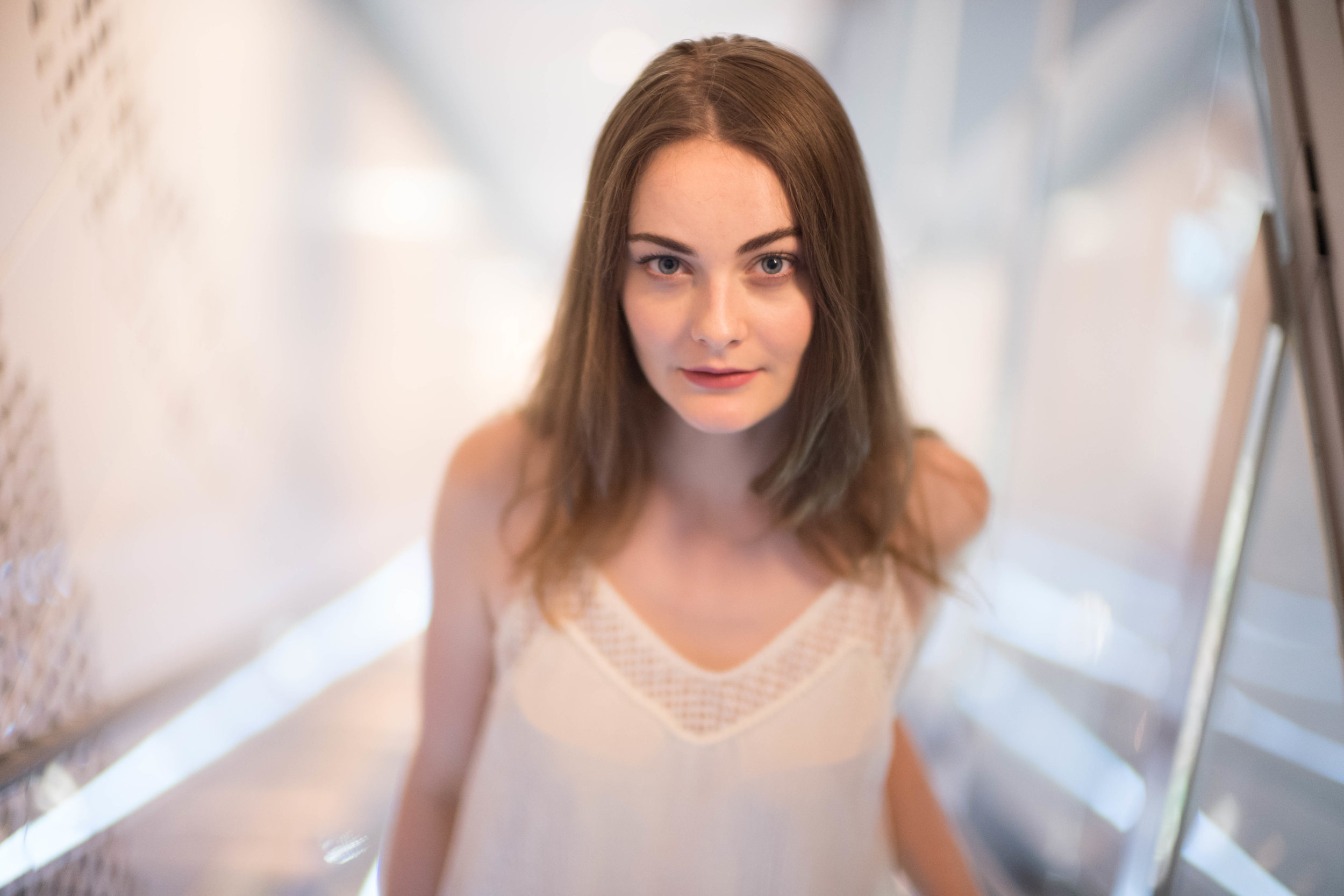 Leica SL + Leica 50mm f/0.95 Noctilux. Wide Open. Shot at closer distance. I included this shot because I love how the bokeh completely blurs the escalator in the background.