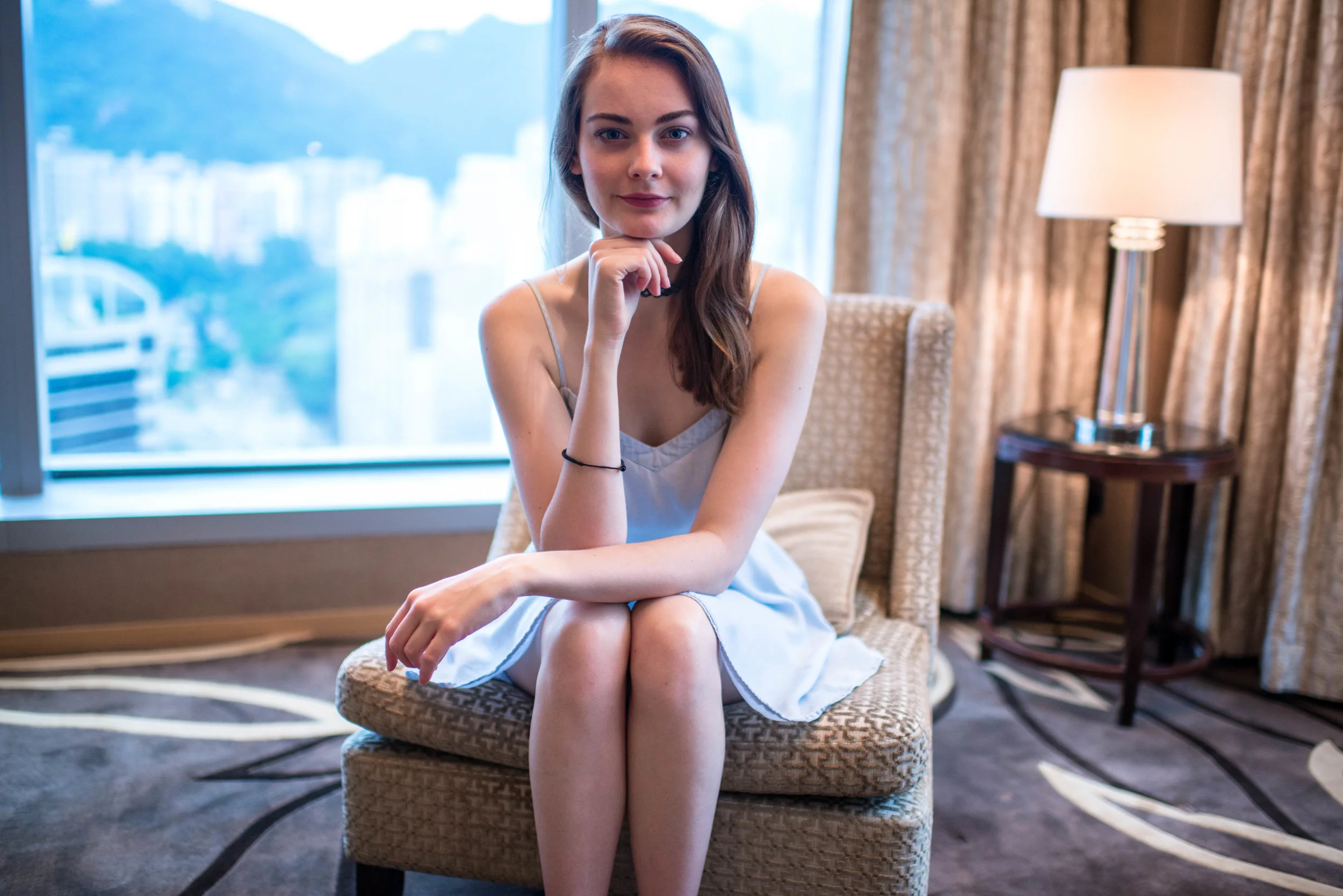 D800E + 35mm f/1.4G. I think I was under ten feet away from the subject.