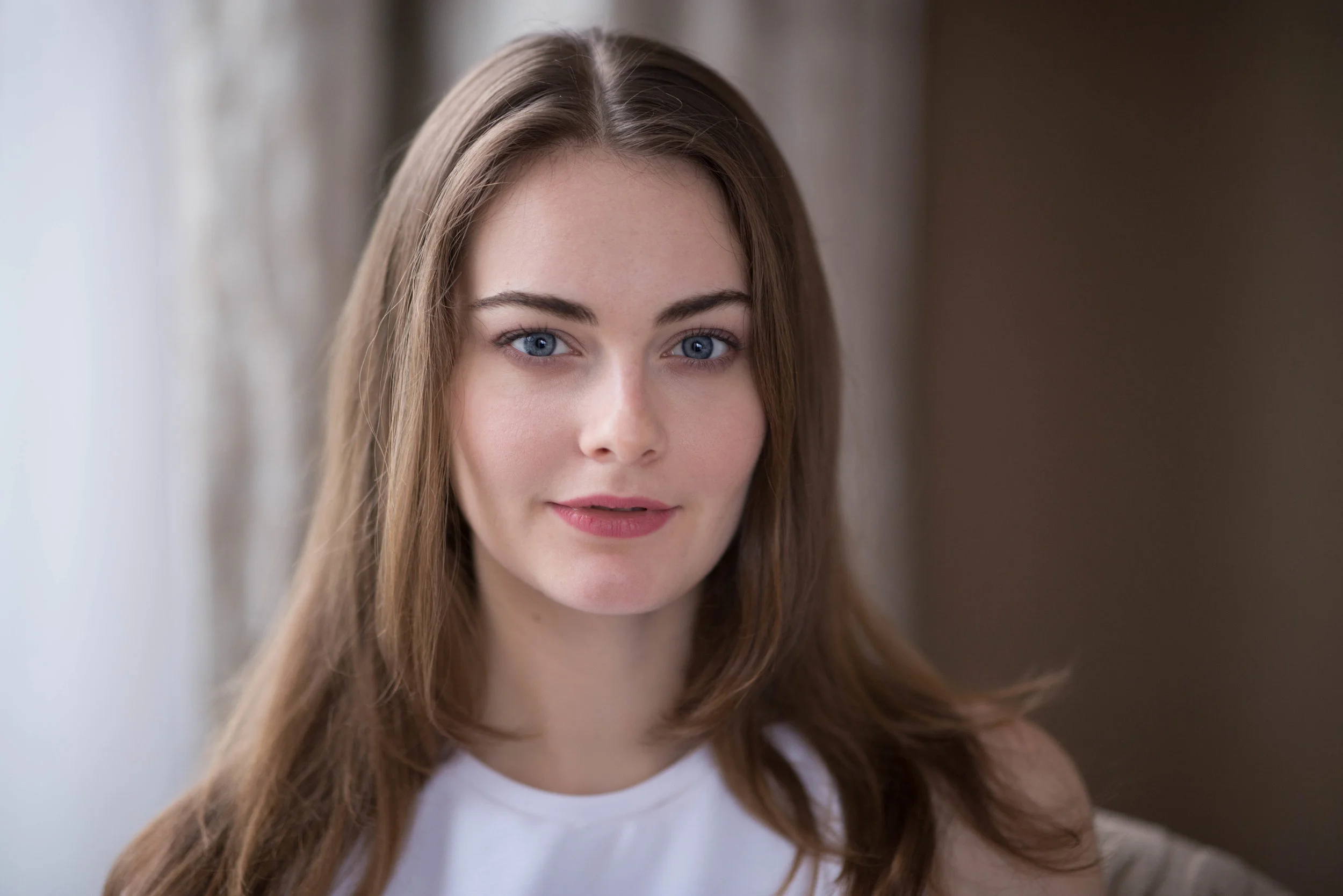 What this lens is made to do. Close up head and shoulder portraitures, with an awful background to render into bokeh.