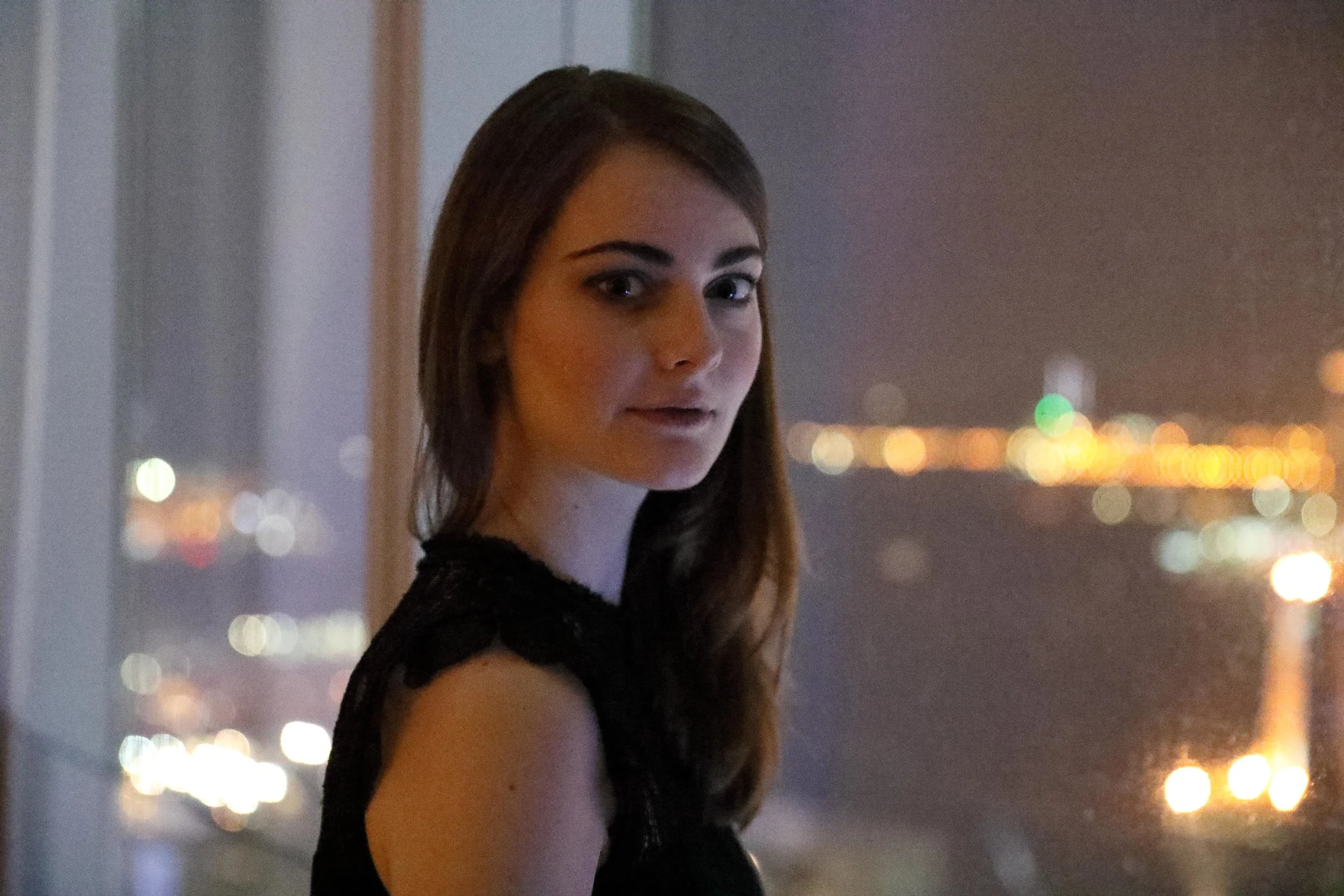 Canon 24-70mm f/2.8 at 70mm, ISO 25,600, 1/100s - pushed 1 stop.