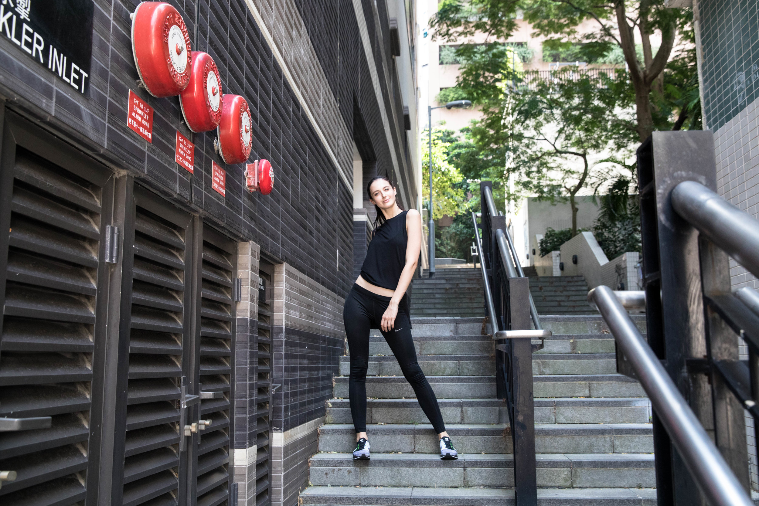 Leaving PMQ. Olga striking a pose down the steps. Shot on the Canon 5D Mark IV. Score: Canon 9, Leica 7.