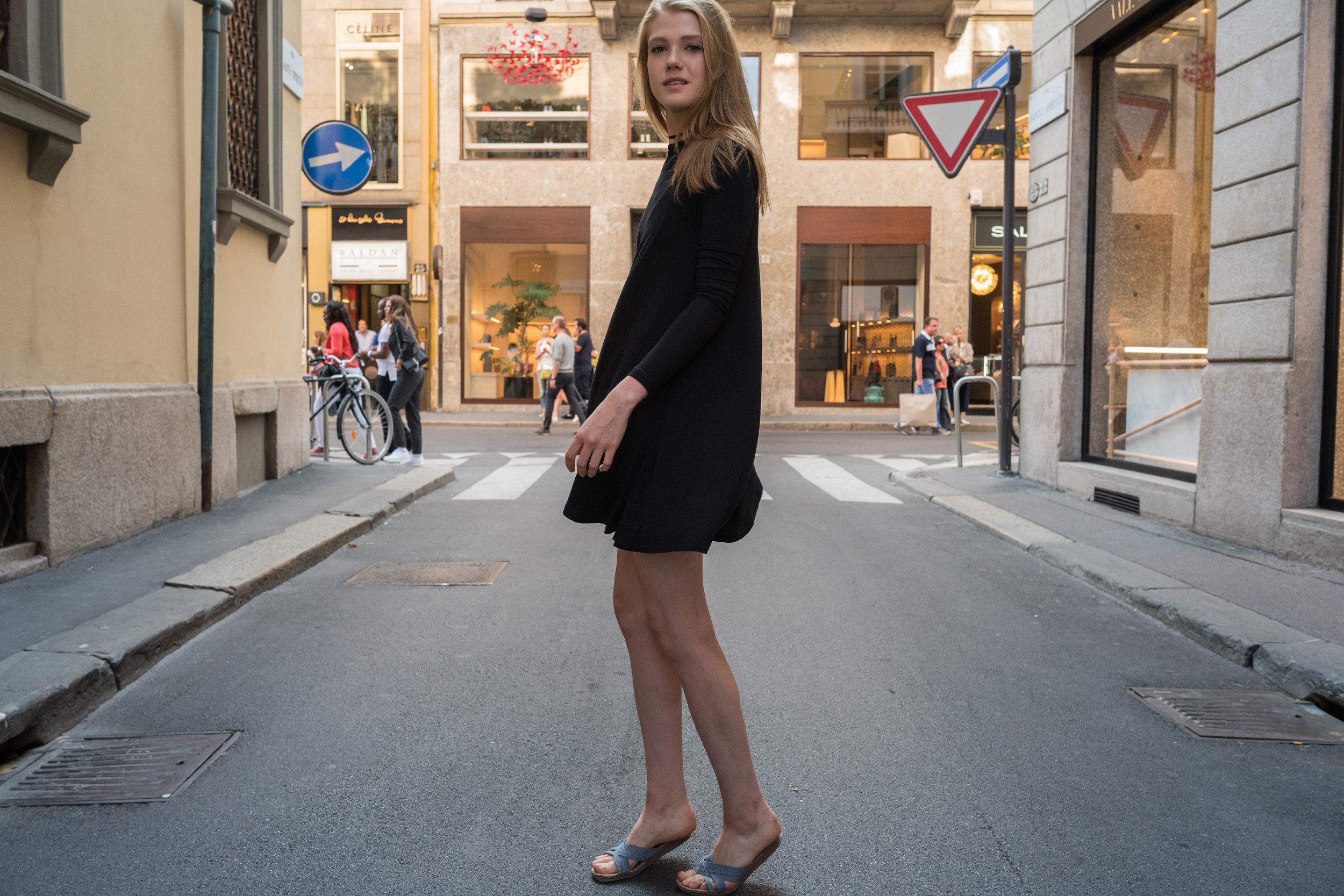 On a side street, off Montenapoleone. It was a zoo out there with all the tourists. Vera is in the process of twirling around.