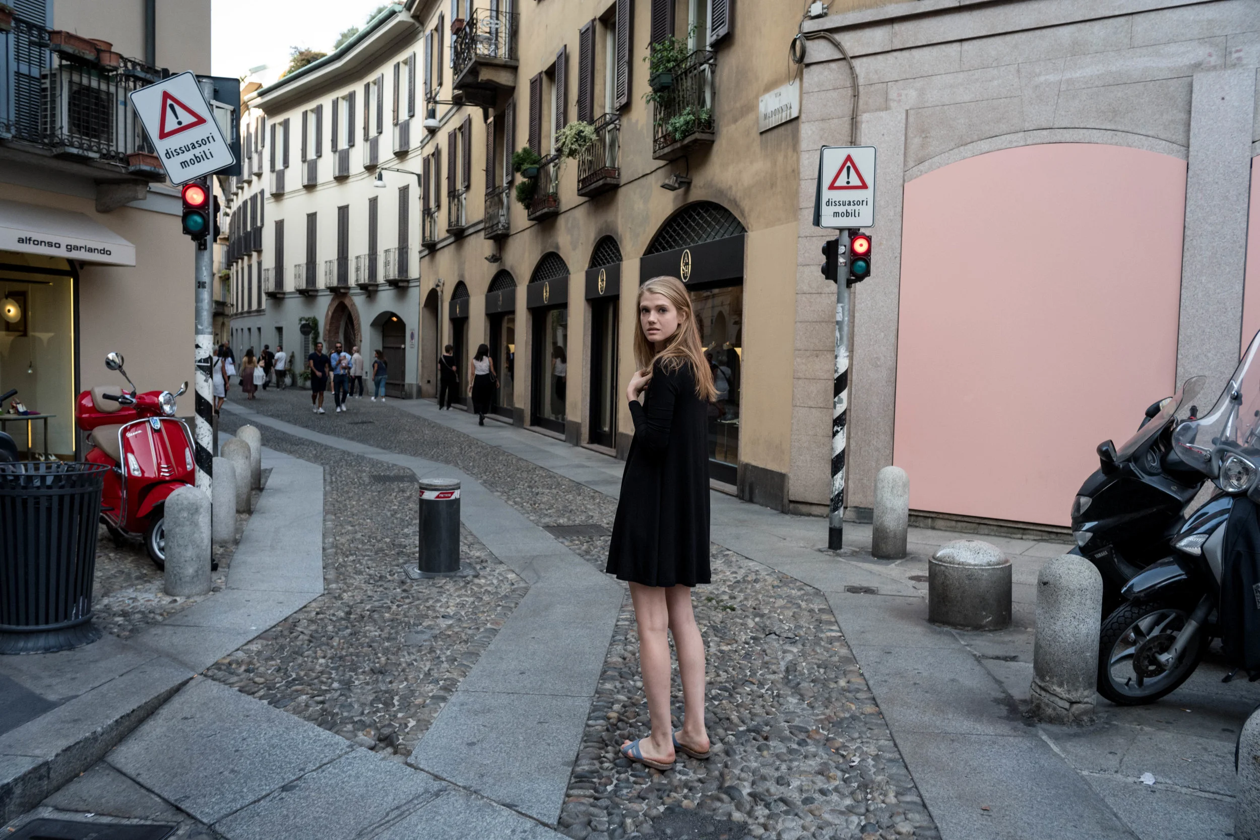 We got lost, and couldn't find our way back to the car. I think I like this photograph, because of the red Vespa on the left. It just makes it seem all the more Italian.