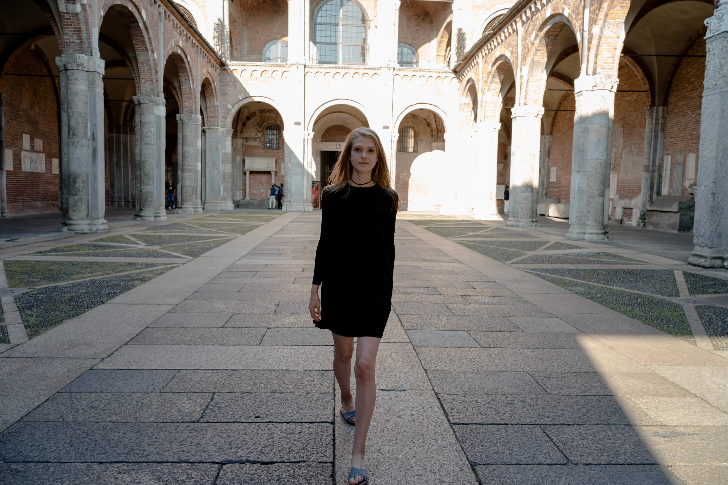 At the Basilica of Sant'Ambrogio. Vera is walking over to me.