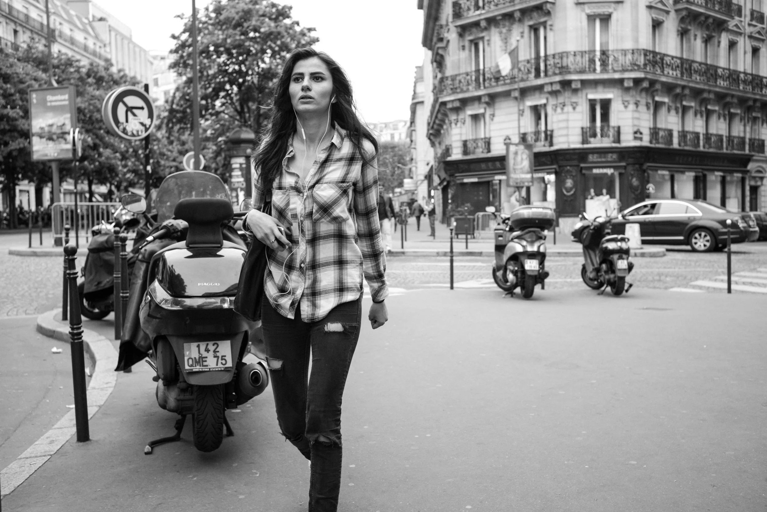Another image shot from the hip. You can tell, given the orientation of the subject in the framing. Luckily, as a composition, it does work. But the way I photographed the image has nothing to do with my perspective. It's just another opportunistic street documentation.