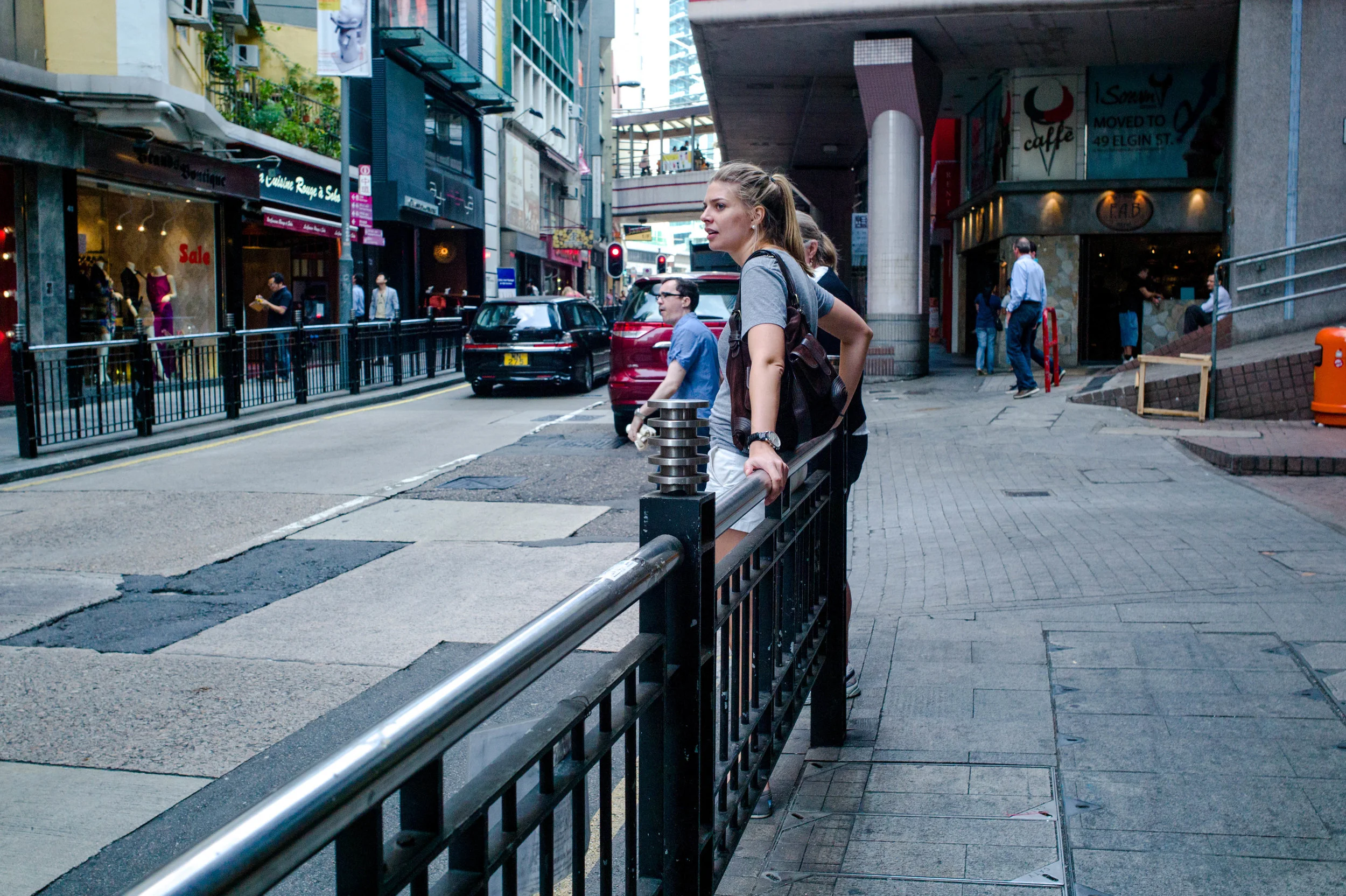 A lady resting against a barrier. Clearly not much of a purpose to this image or any of the other images I randomly selected from my photo archive. Admittedly, my expectation might appear unreasonably high. However, I do feel very strongly about it. Without an obvious purpose, I just don't see the point of pretending to be a street photographer.