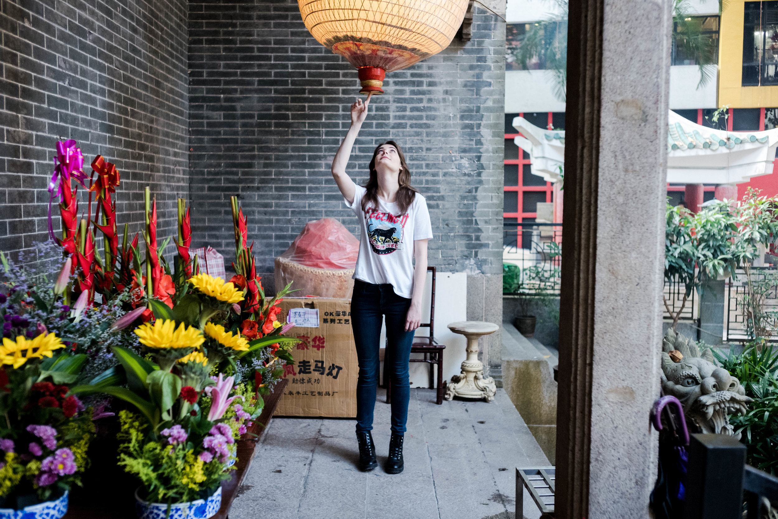 35 Cron, f/2.8 - Anna is investigating a large paper lantern.
