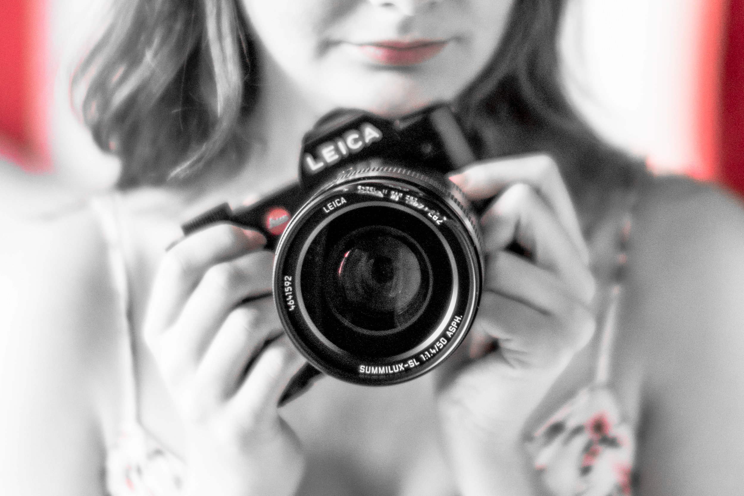 Desaturated "Documentary Style" to emphasize the damaged region (while still keeping the Leica red in frame, no less) - Magnification x4