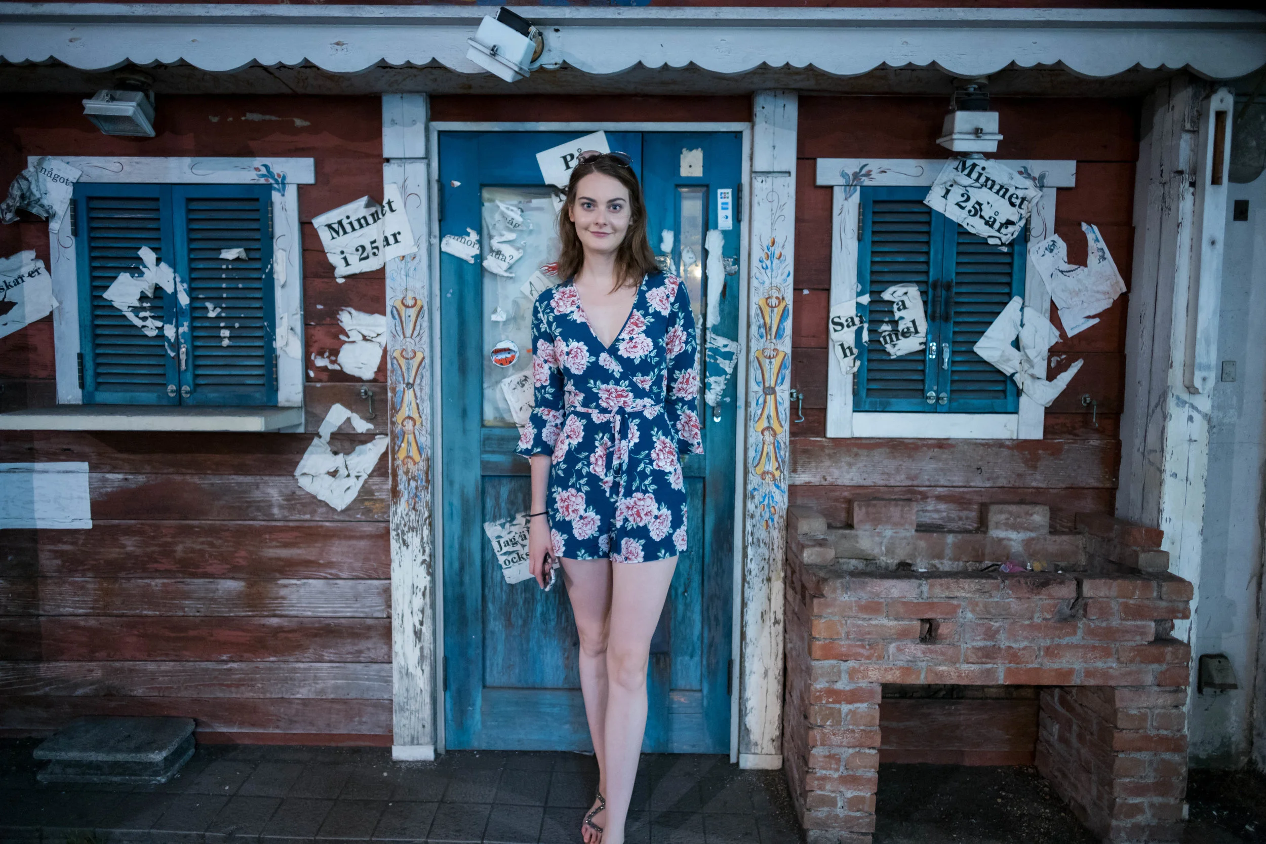 In front of a closed down establishment.