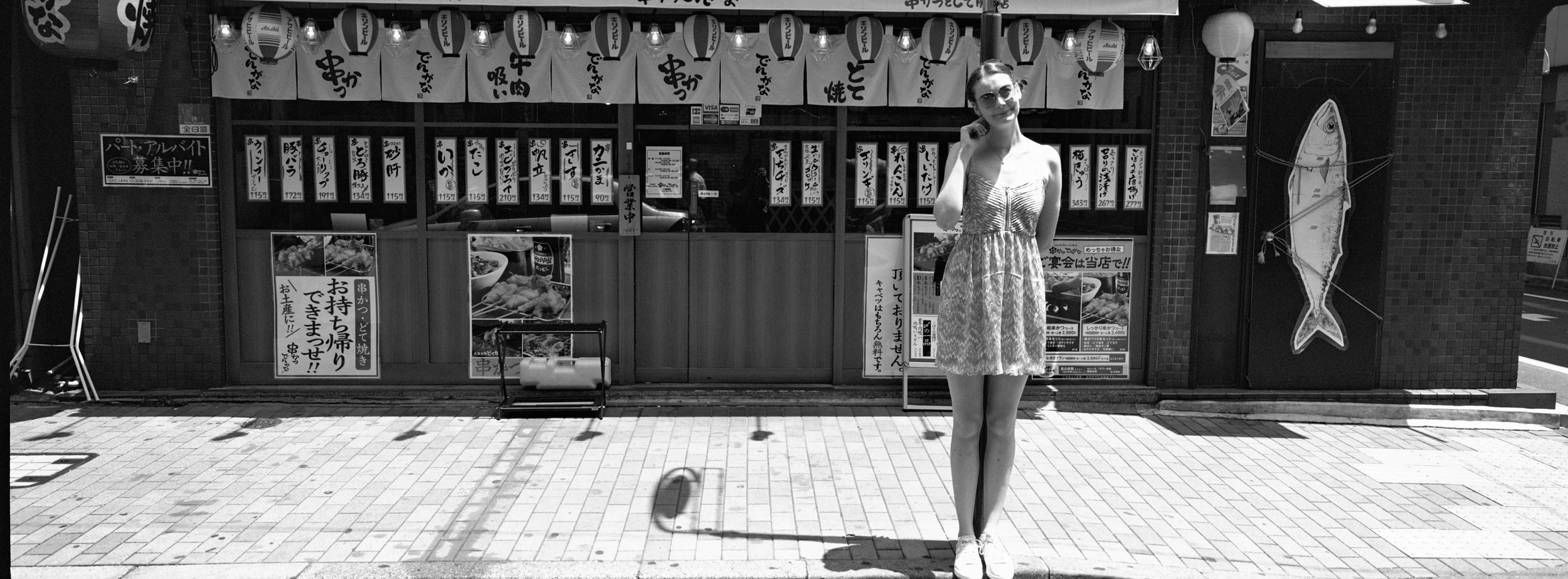 Outside a sushi establishment, at the Ginza - Ilford XP2 Super 400