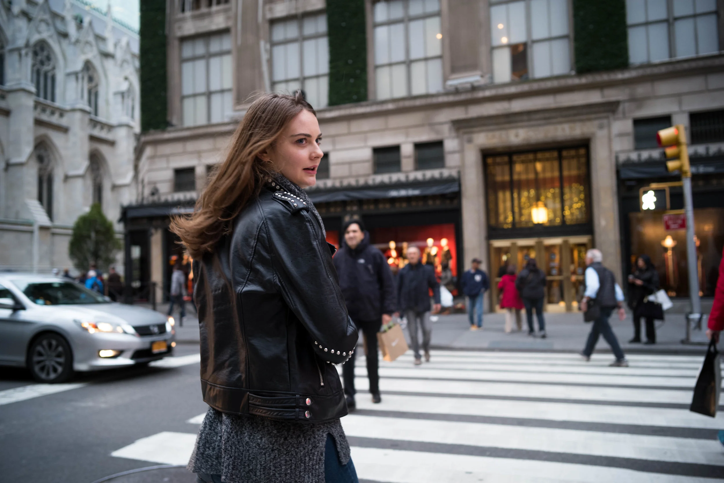 Crossing Fifth Avenue towards Saks Fifth Avenue.