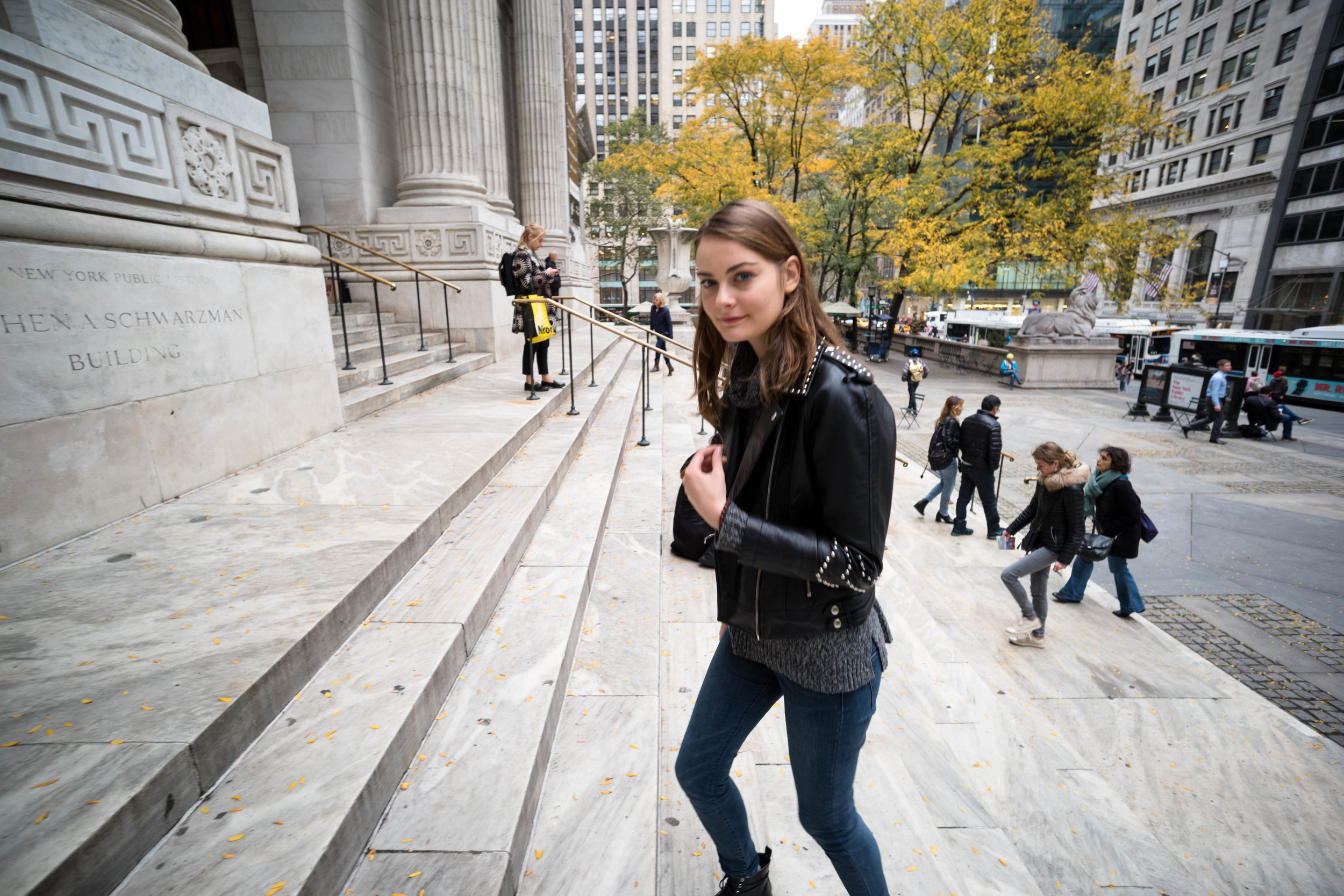 Up the steps, at the New York City Public Library.