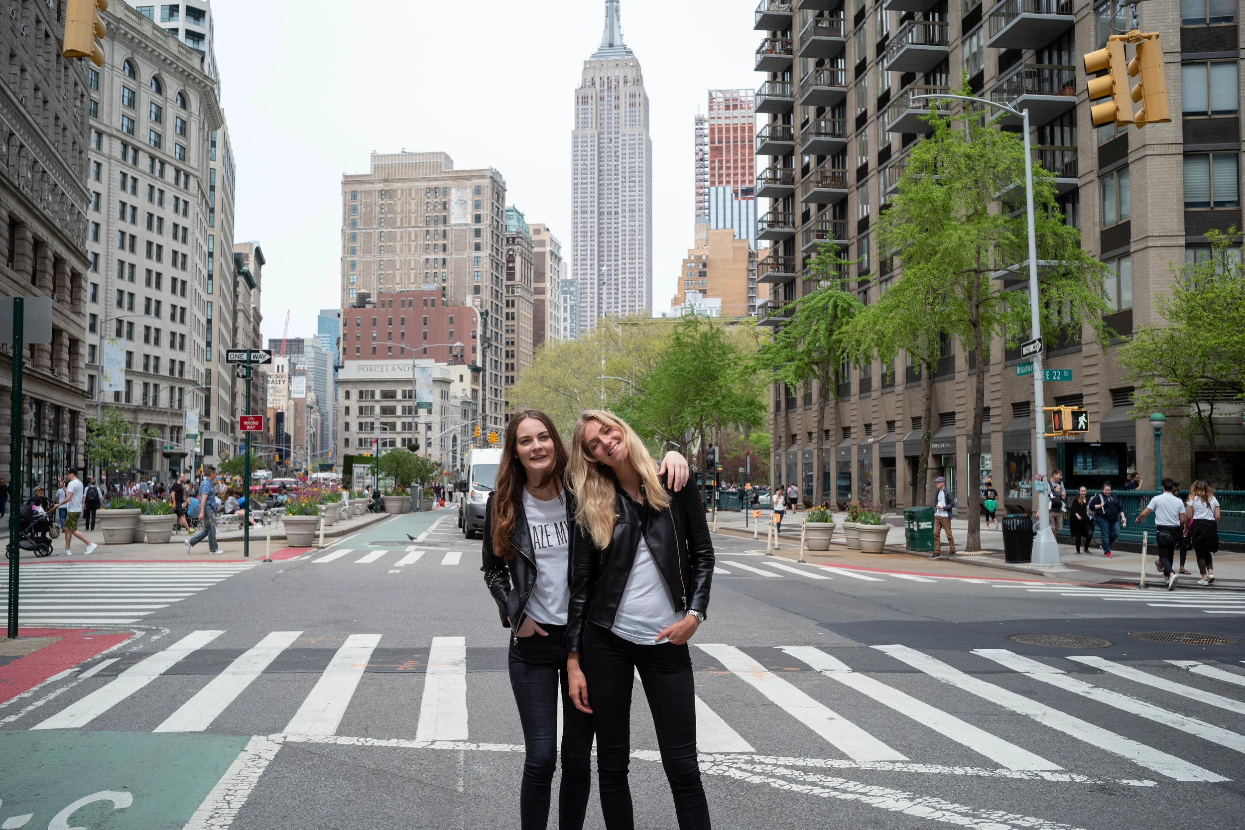 On Broadway, with the Empire State Building in the background.