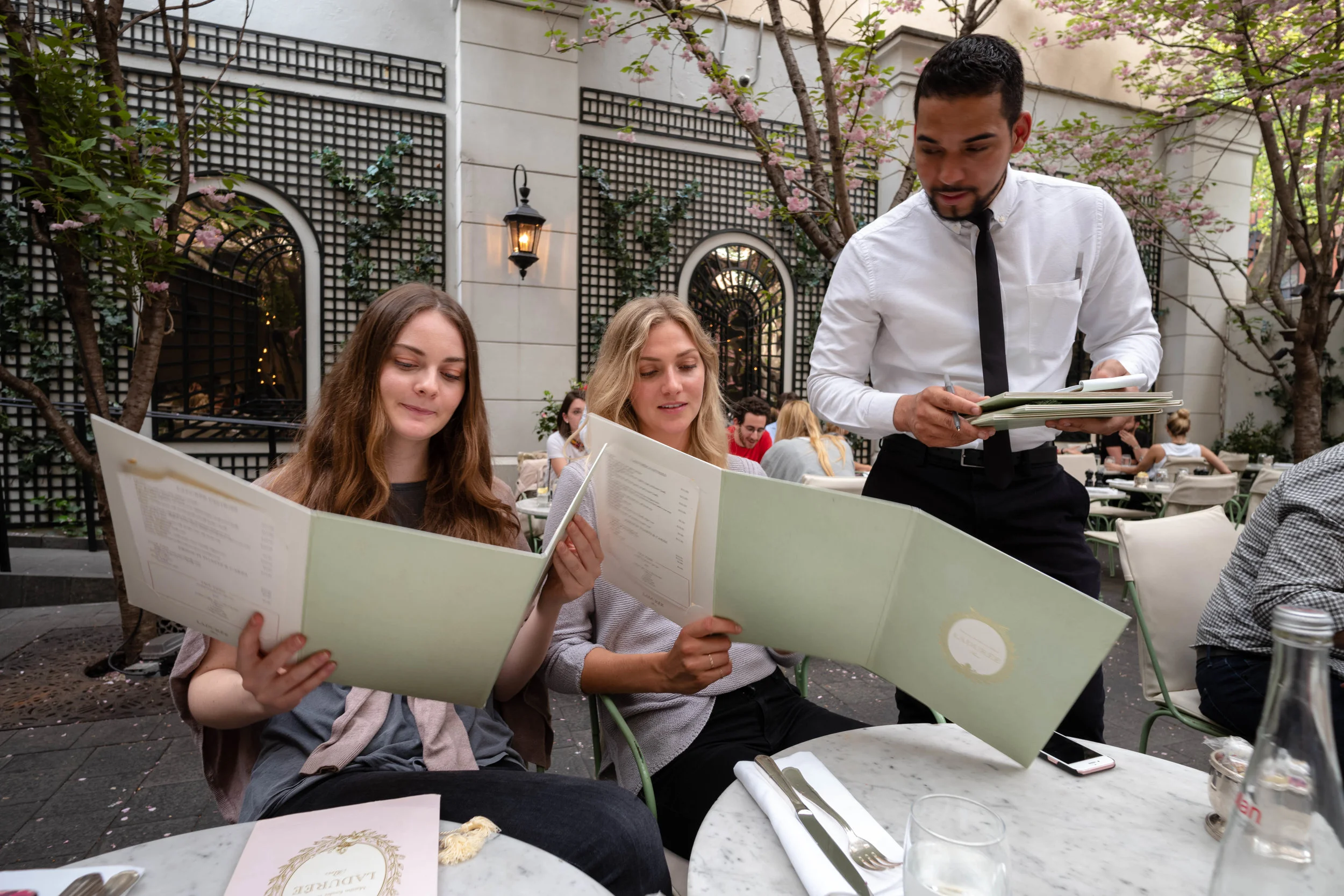 Leica M10 + 18mm f/3.8 Super Elmar-M ASPH - Much of the distortion was mitigated by the menu. Still, the waiter is noticeably distorted. But that doesn't matter as much, given the context of the waiter relative to the documentation.