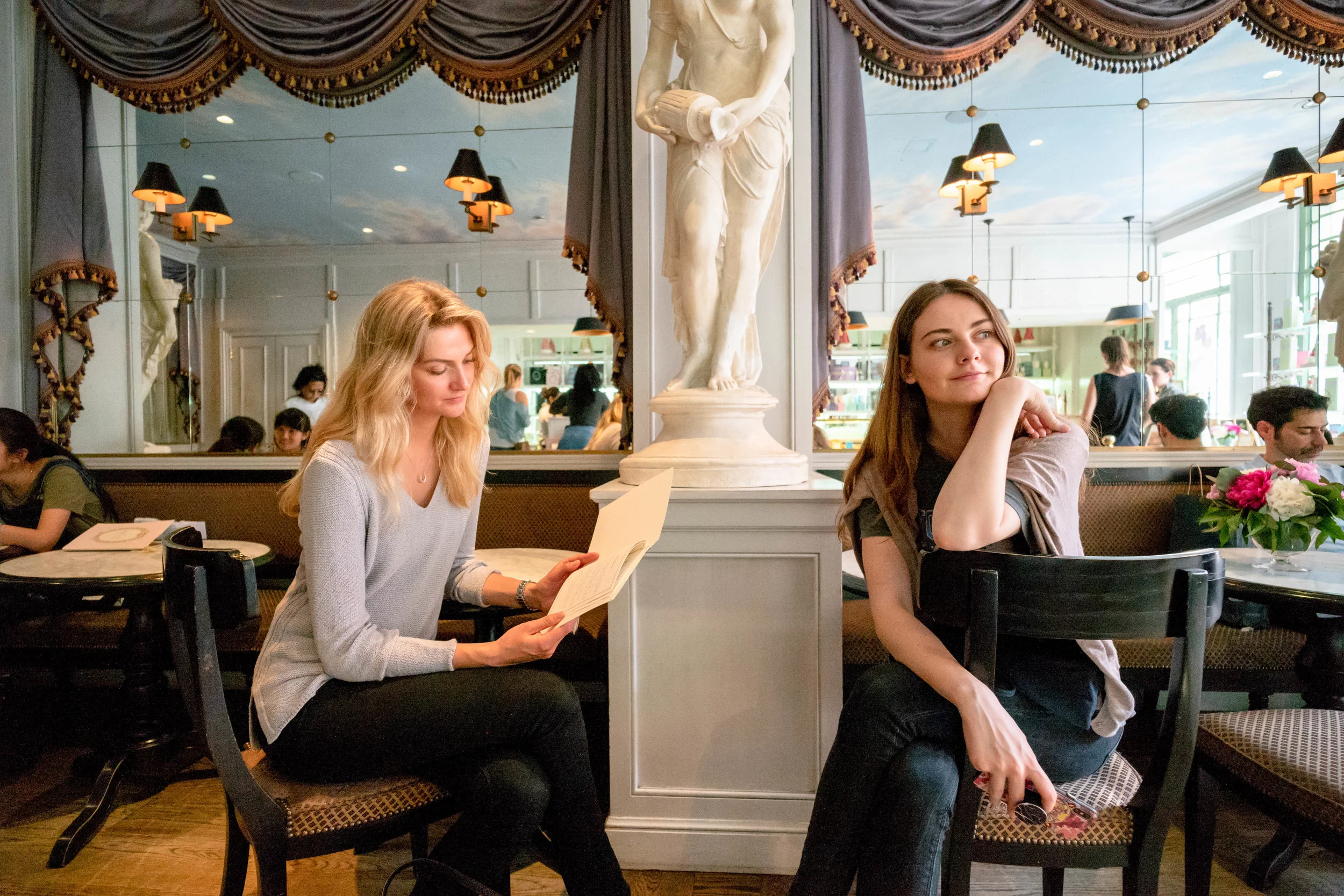 Leica M10 + 18mm f/3.8 Super Elmar-M ASPH - With Lydia and Anna seated further from the center, and at closer focusing distance, distortion is evident. It's even more evident on the people in the background (but less so with the ones further away caught in the mirror).
