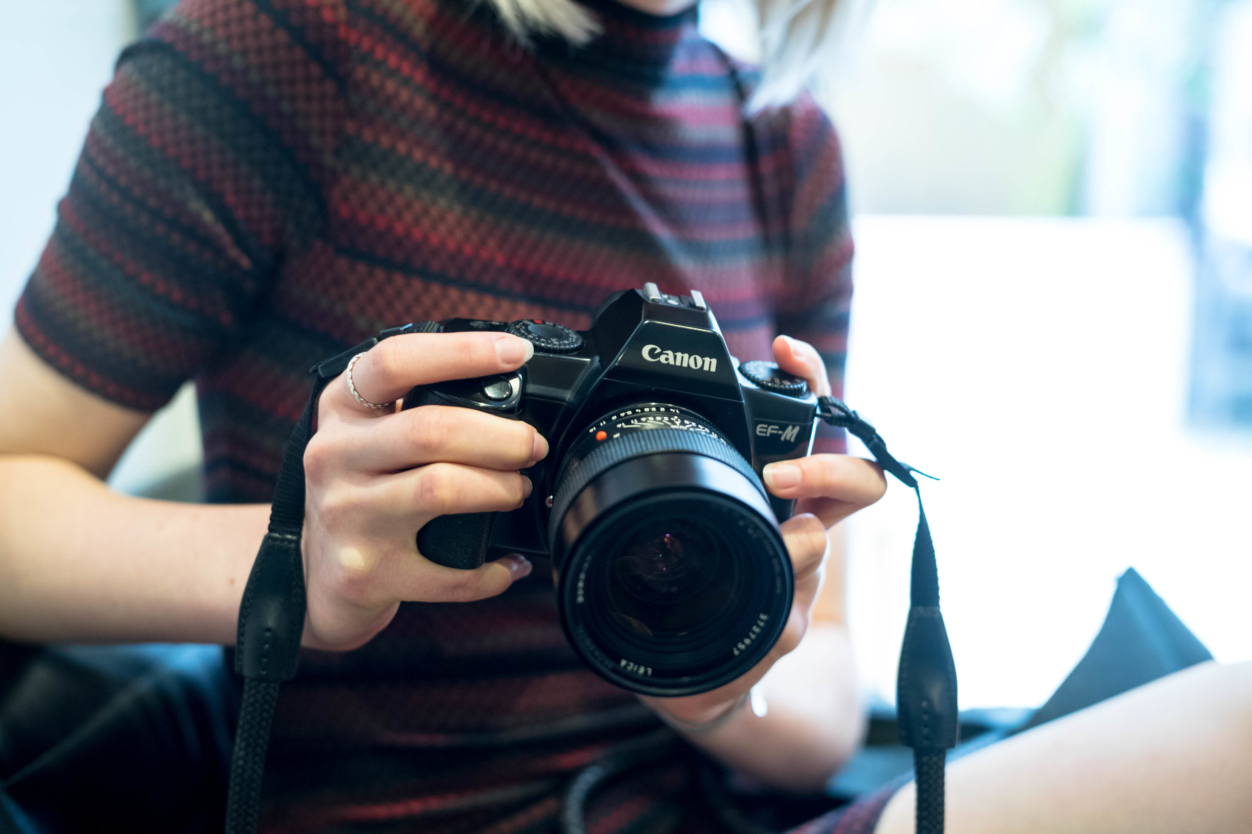 Scenes of a botched photoshoot. One of two Canon E-FM cameras with faulty shutter travel.