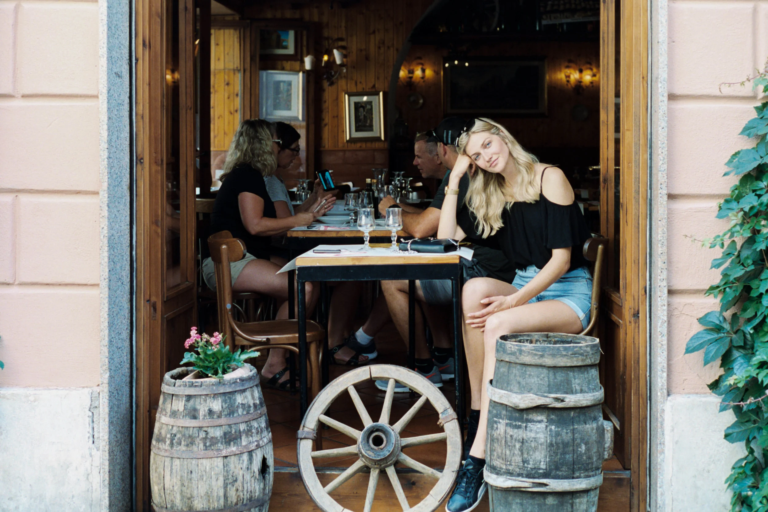 Leica M6 + Kodak Portra 400 + Leica 50mm f/2 Summicron-M vers. III - At the 50mm focal length, the background diners are pulled closer to the subject.